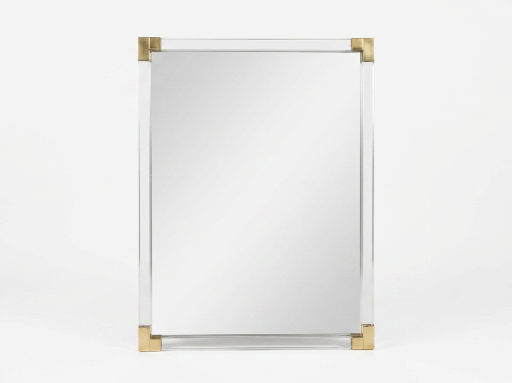AN ITALIAN LUCITE AND BRASS MIRROR