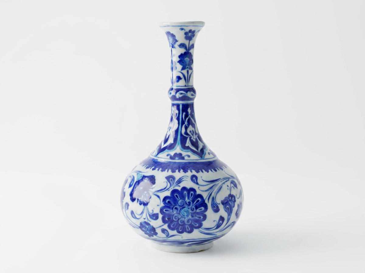 A PERSIAN IZNIK POTTERY VASE