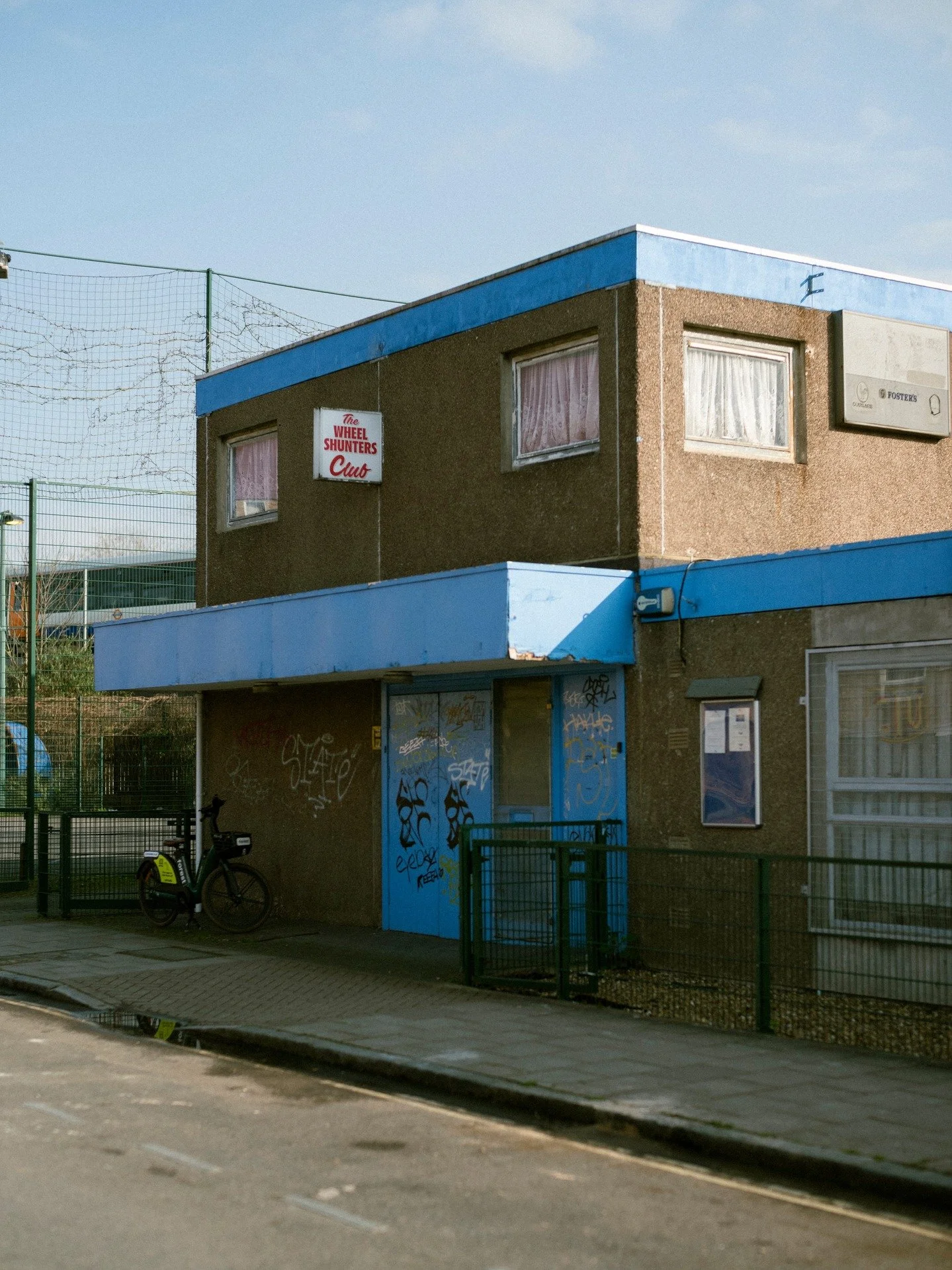 I&rsquo;ve been photographing the areas around London football grounds, not just the clubs themselves, but the streets, people, routines and spaces that gather around them.

Starting with my local club - Millwall - this project is about place: how lo