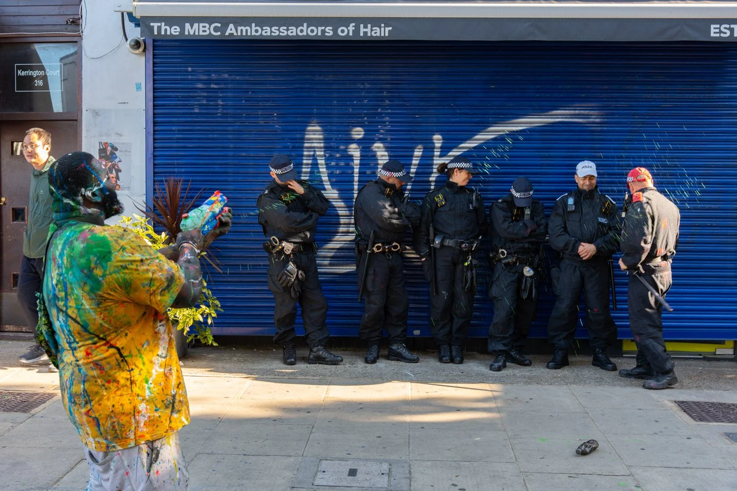 Portrait-photographer-london-notting-hill-carnival-paint-fight-22.jpg