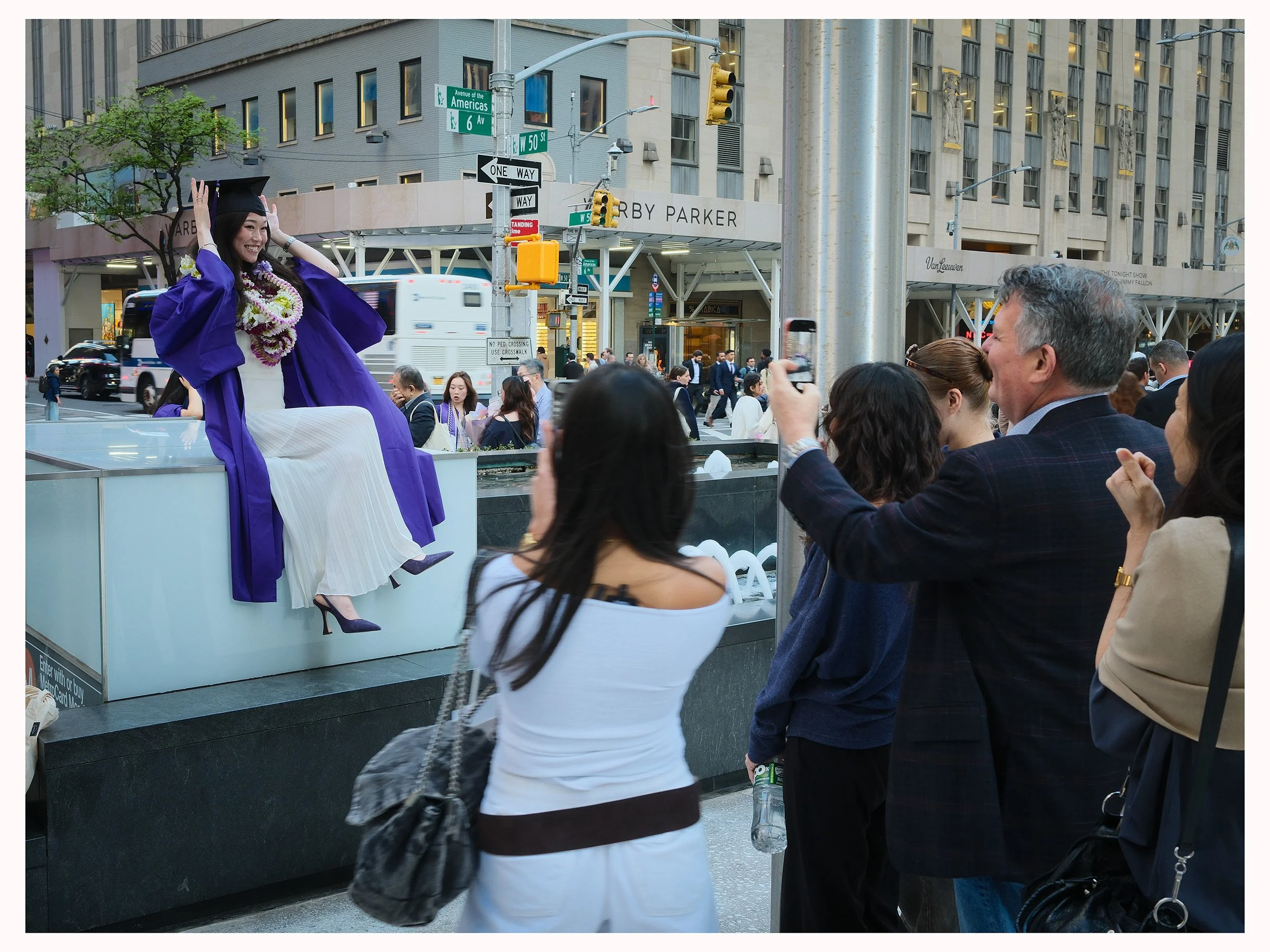 2026 NYU Graduate and her family celebrate outside Radio City Music Hall, New York City