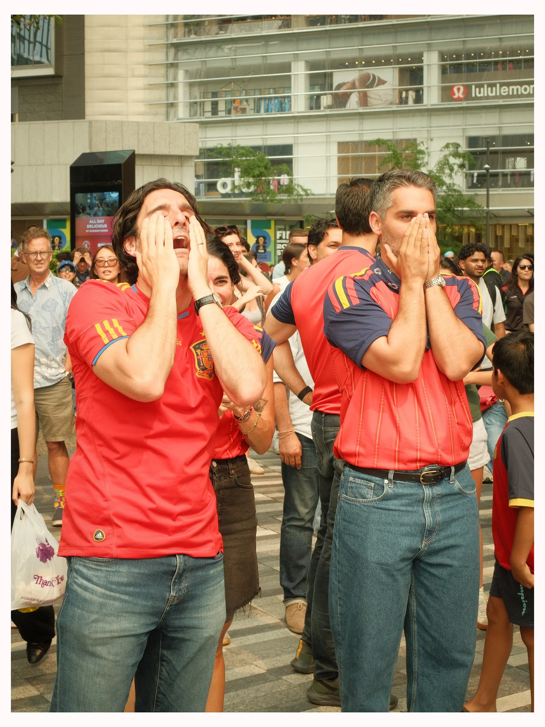 Fans watching Spain compete in the 2026 FIFA World Cup, Hudson Yards, New York City