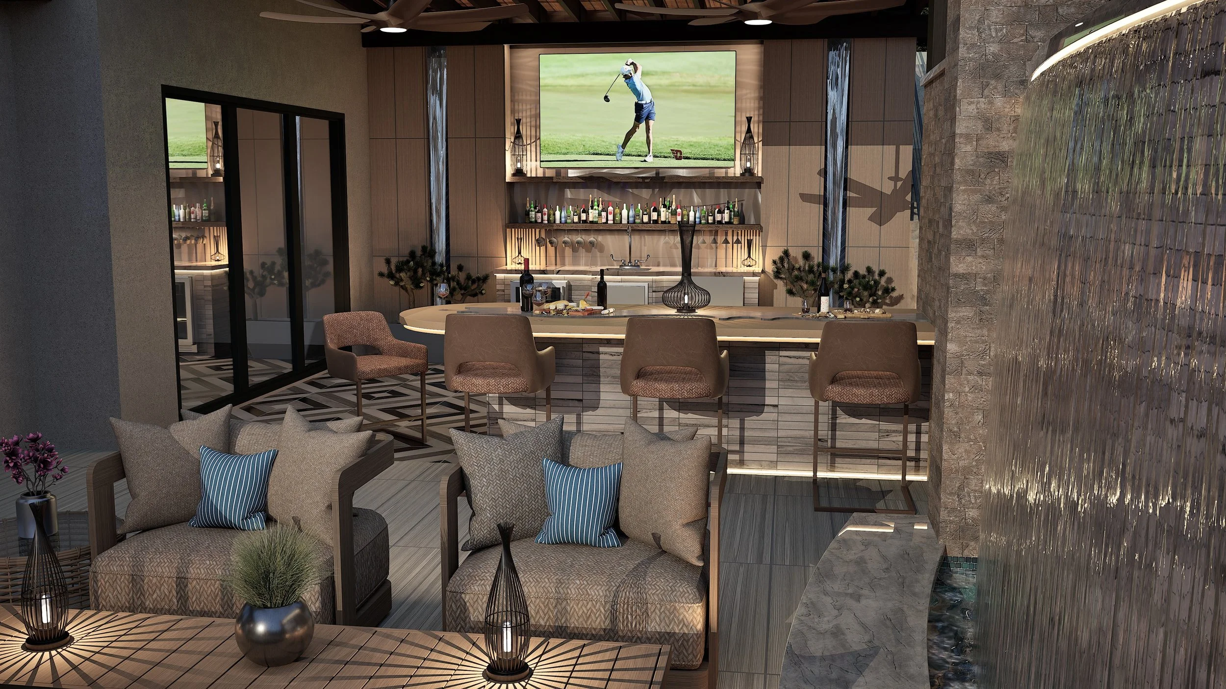 Indoor lounge with a bar area, barstools, a large flat-screen TV showing a golfer, and seating with pillows. Decor includes a water feature on the right, plants, and modern lighting.