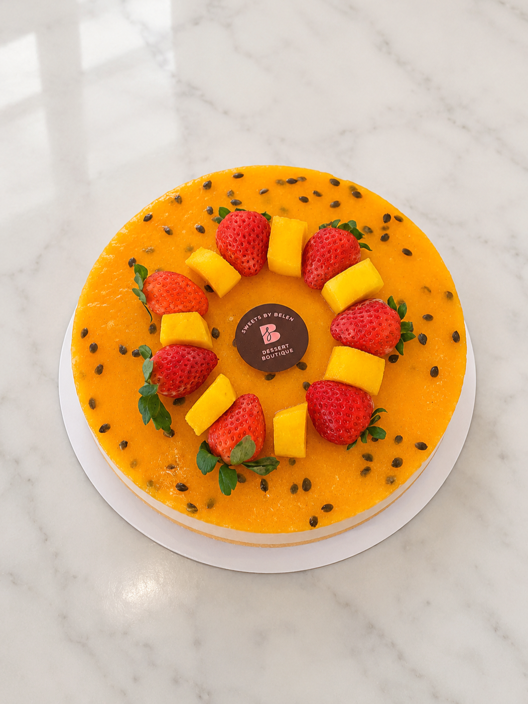 8” Maracumango Cheesecake