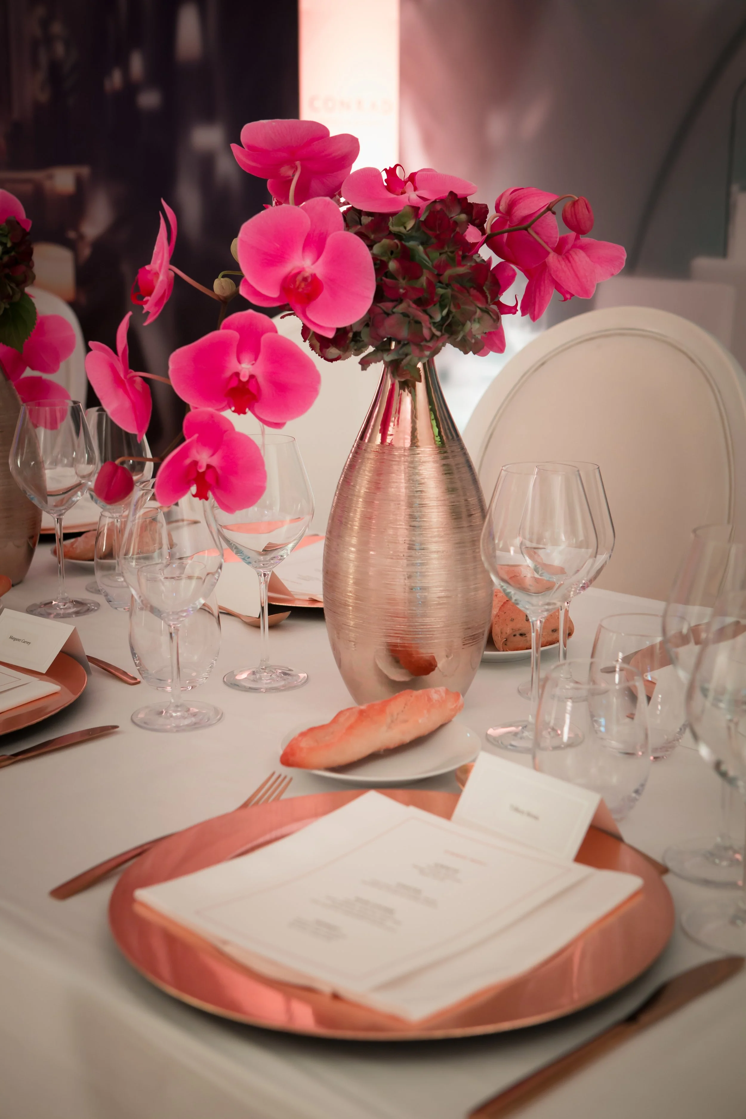 Conrad Hotels ILTM Cannes — copper and rose gold table design with fuchsia orchids and crystal stemware, Tiny Penthouse Studio