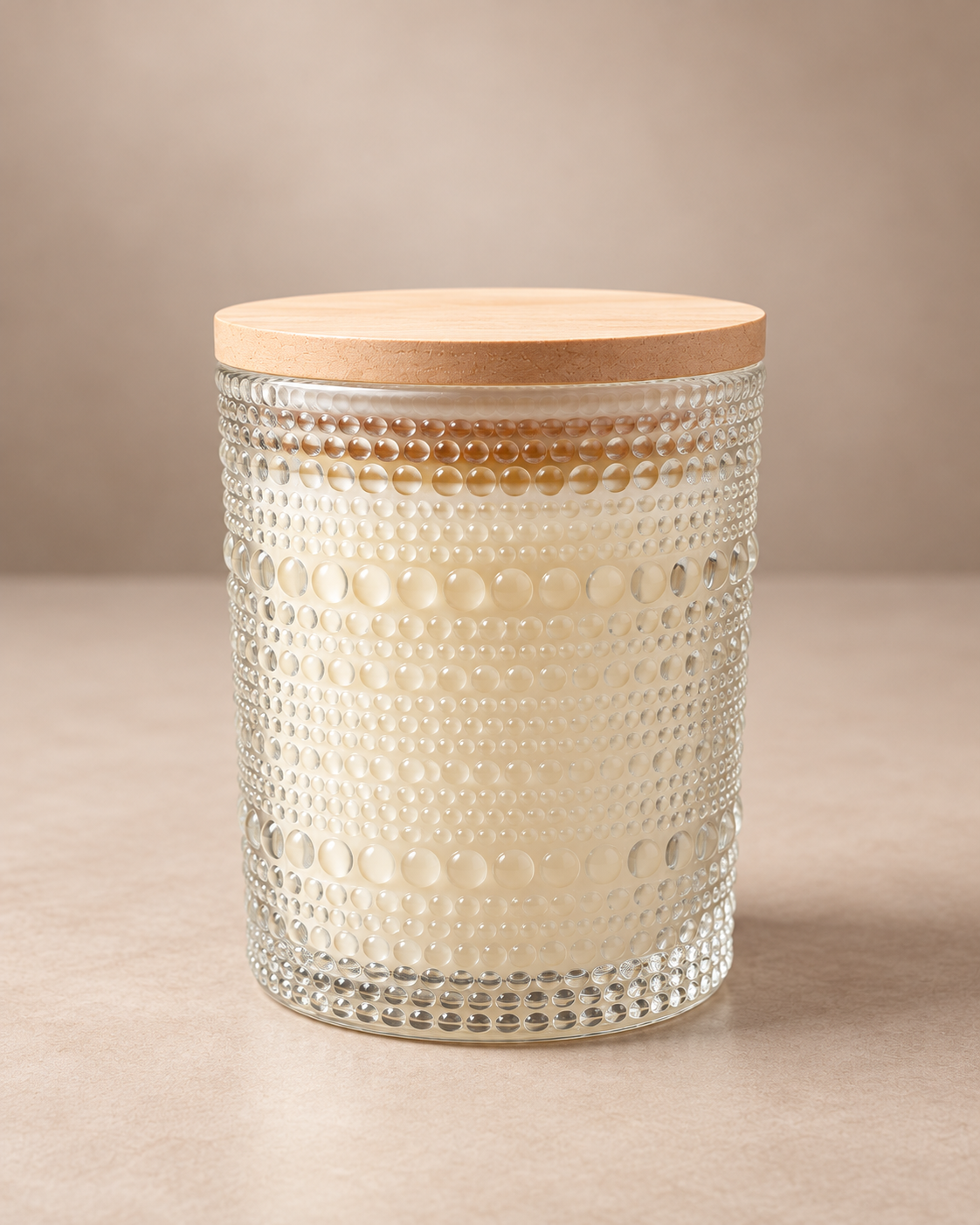 Ro Hus scented candle in clear crystal textured glass by Hemlock Grove Soap Company.