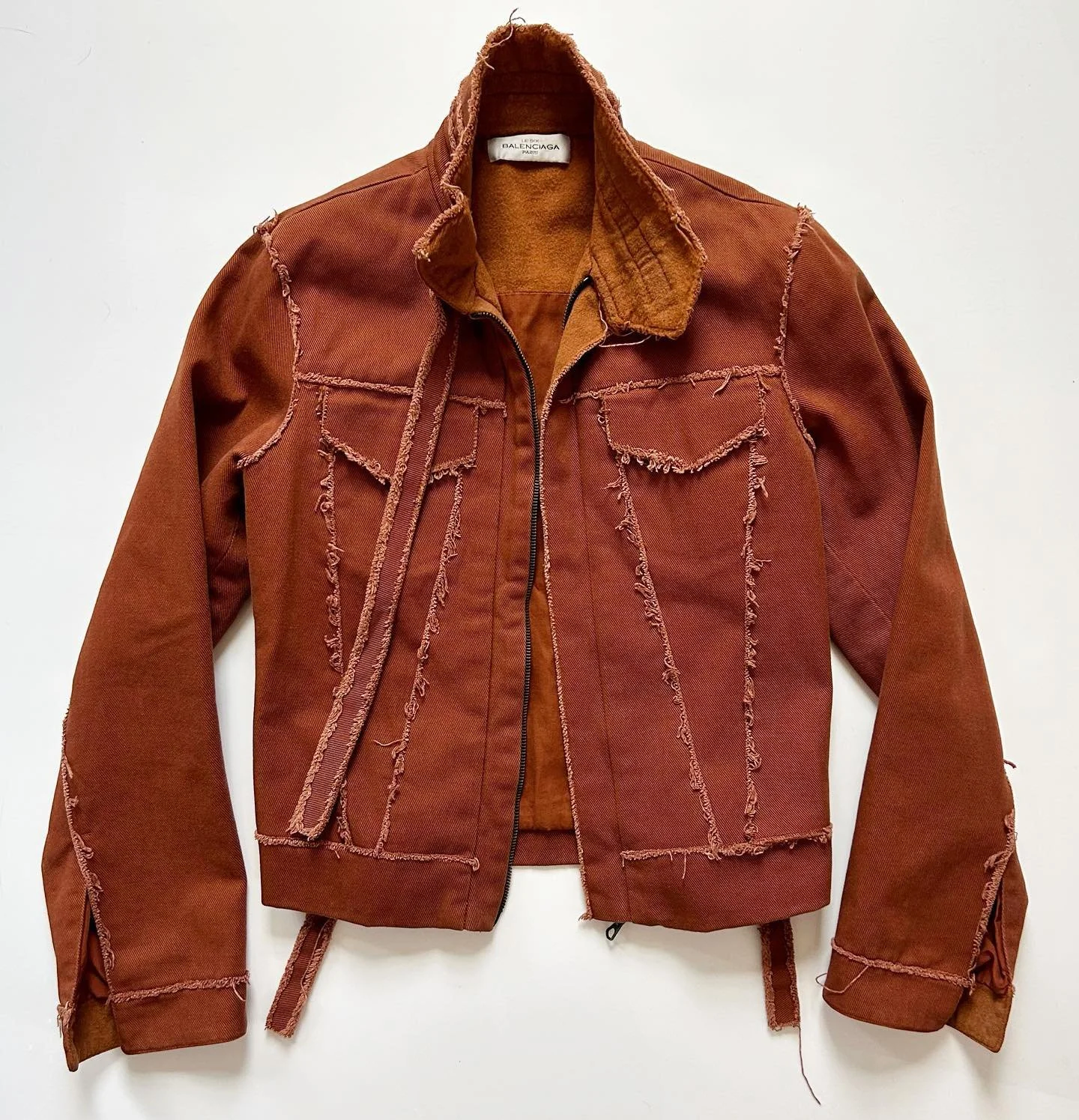 This one&rsquo;s a deep cut 💿 A beautifully detailed Balenciaga jacket circa Fall 2000 that didn&rsquo;t make it onto the runway but features the same raw hems and rust color seen throughout the collection