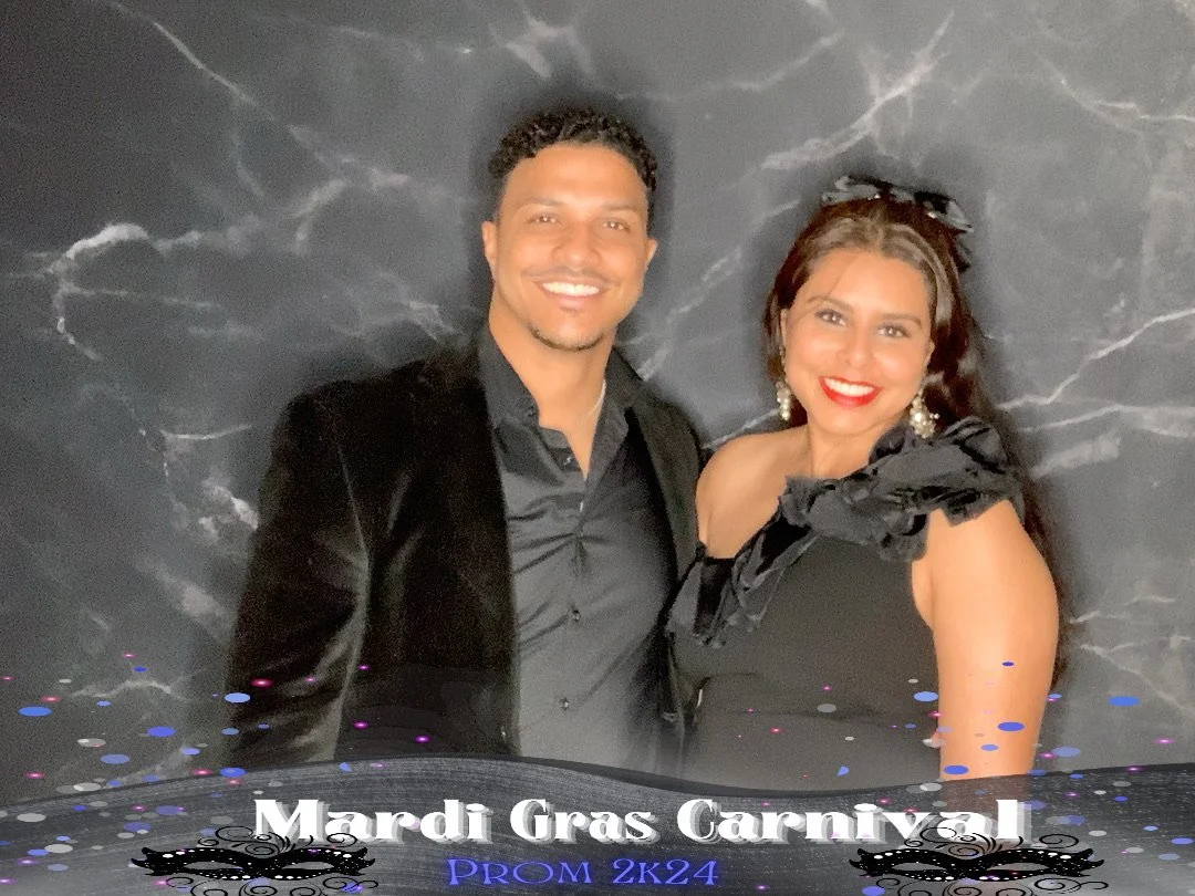 A man and woman dressed in formal attire at a Mardi Gras carnival event, with the text "Mardi Gras Carnival PROM 2K24" at the bottom of the image.
