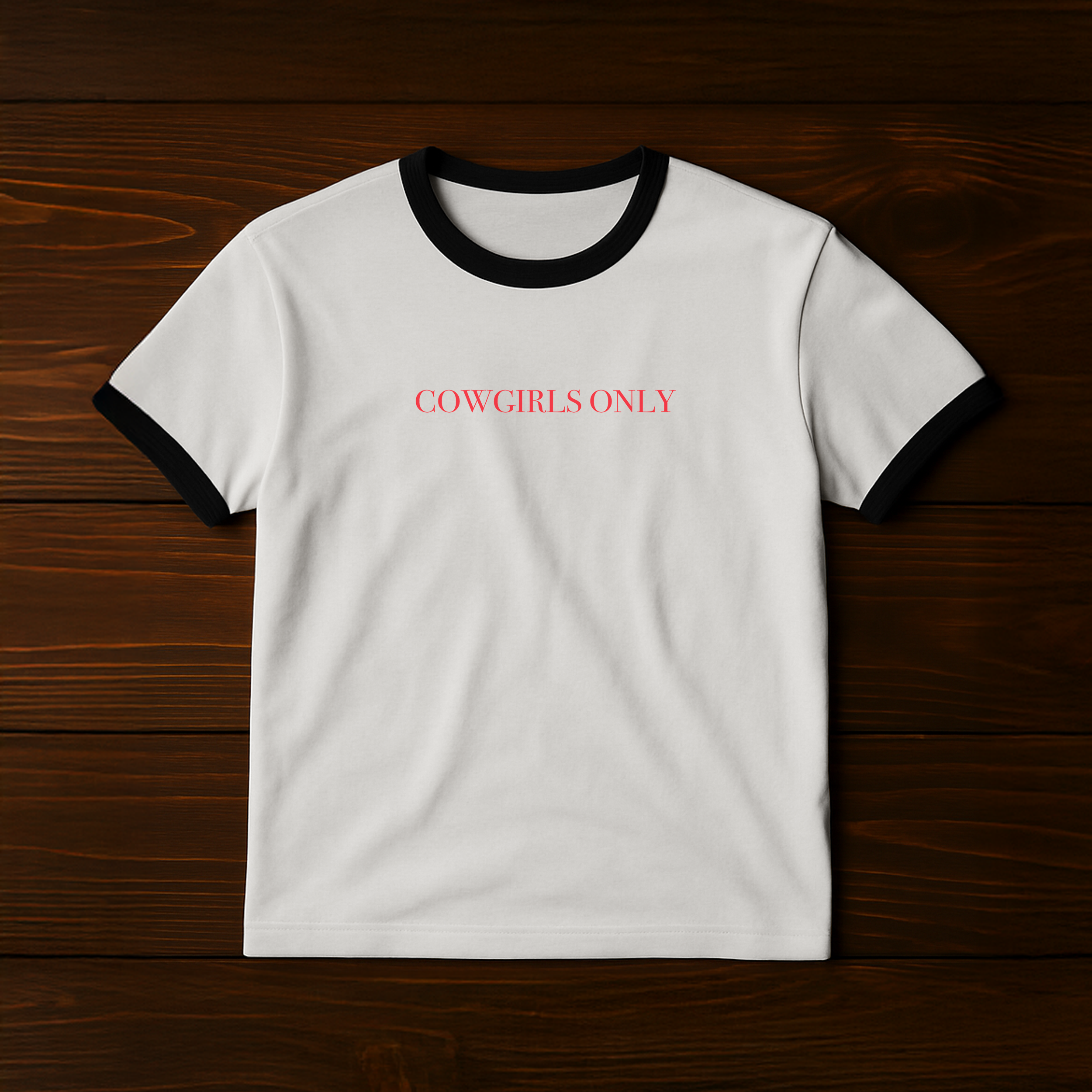 Cowgirls Only Vintage Ringer Tee in white with black collar and sleeves, red text on chest.