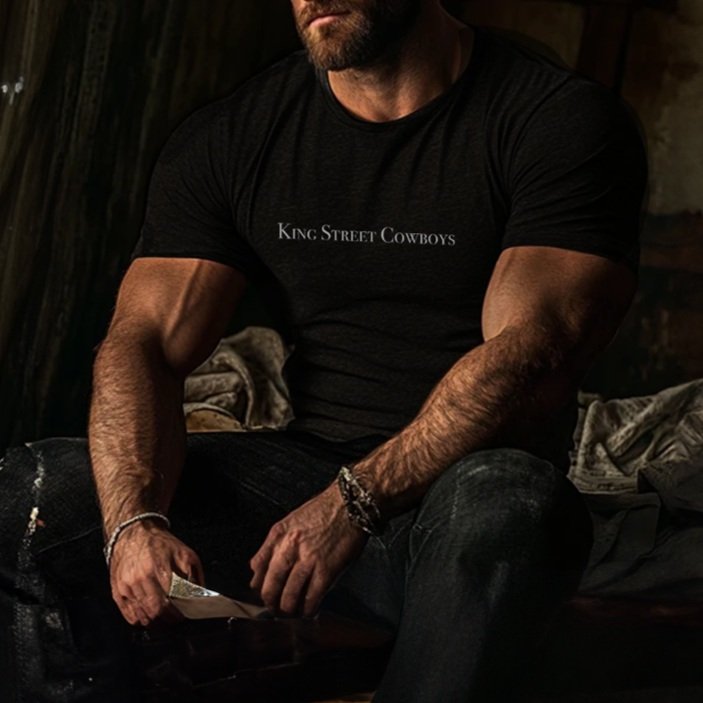 Front view of black King Street Cowboys T-Shirt with white logo