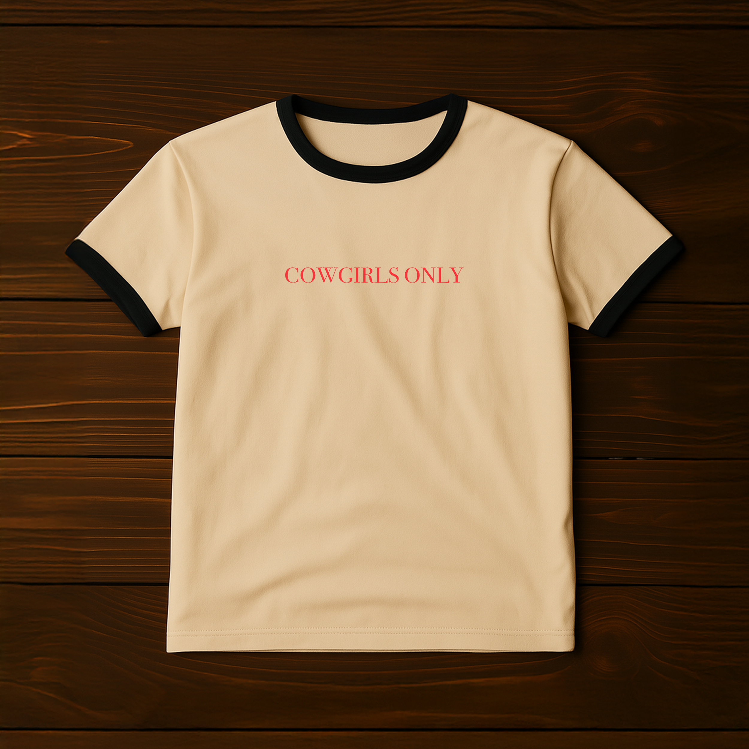 Cowgirls Only Vintage Ringer Tee in tan with black collar and sleeves, red text on chest.