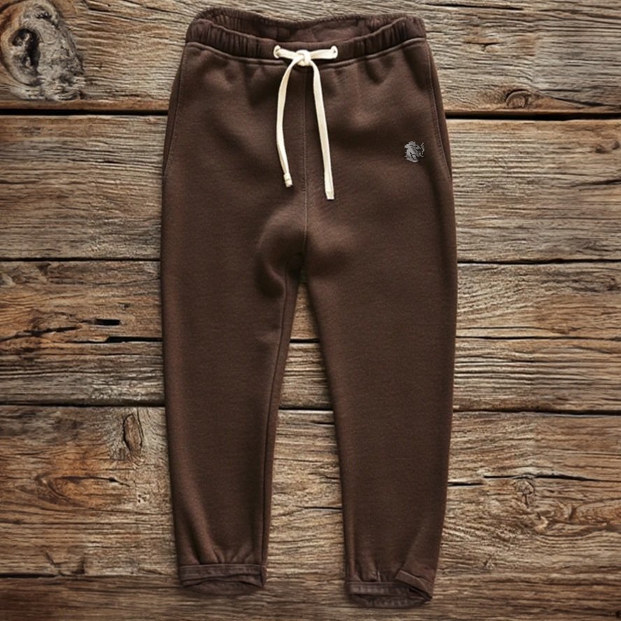 Front view of espresso Rebel Sweats with ribbed waistband and relaxed leg