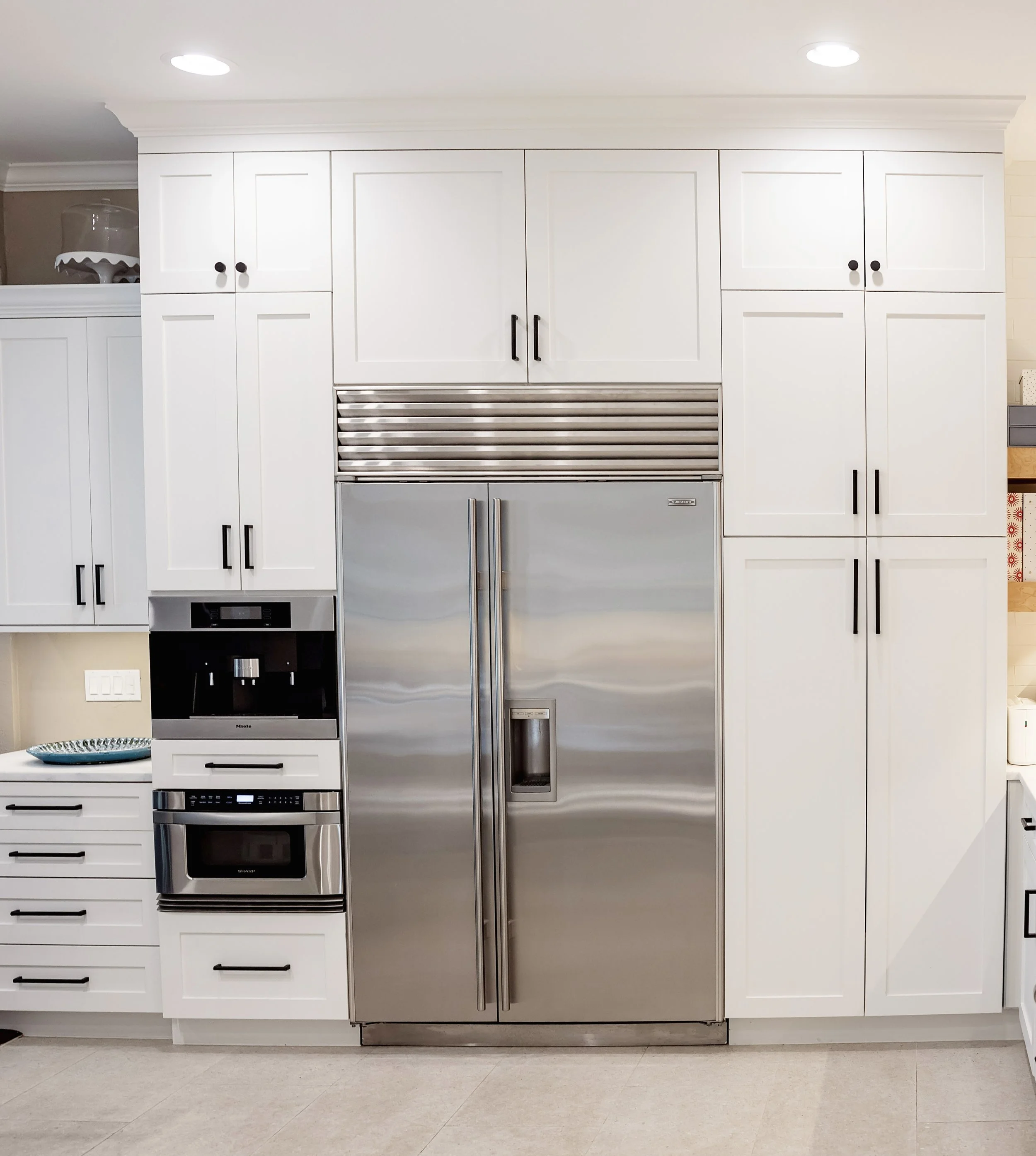 AFTER PICTURE - CABINETS TO CEILING