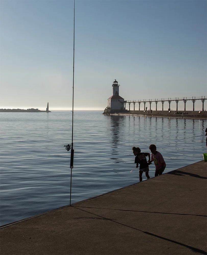 FishingByLighthouse-MI-City_3060_JGummersall.jpg