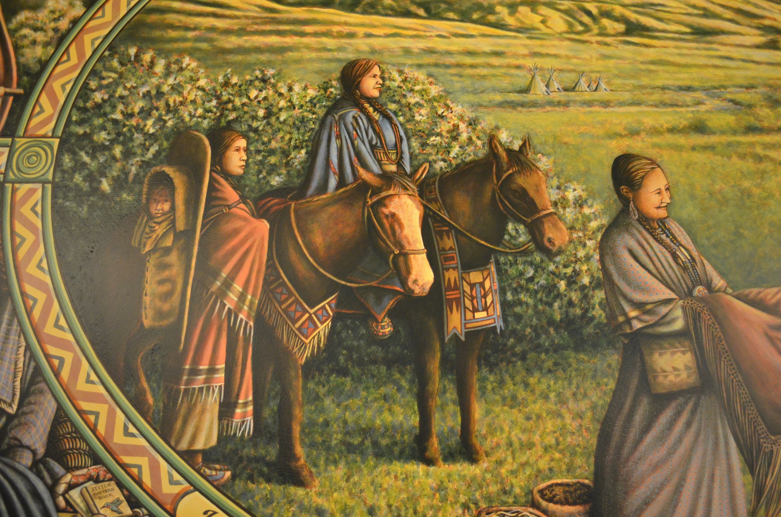 Julie Cajune, a Native American member of the mural committee, took Hadley to the Flathead Reservation so that Hadley could photograph Julie’s friends in authentic Native American clothing and accessories. In addition to establishing historical authe