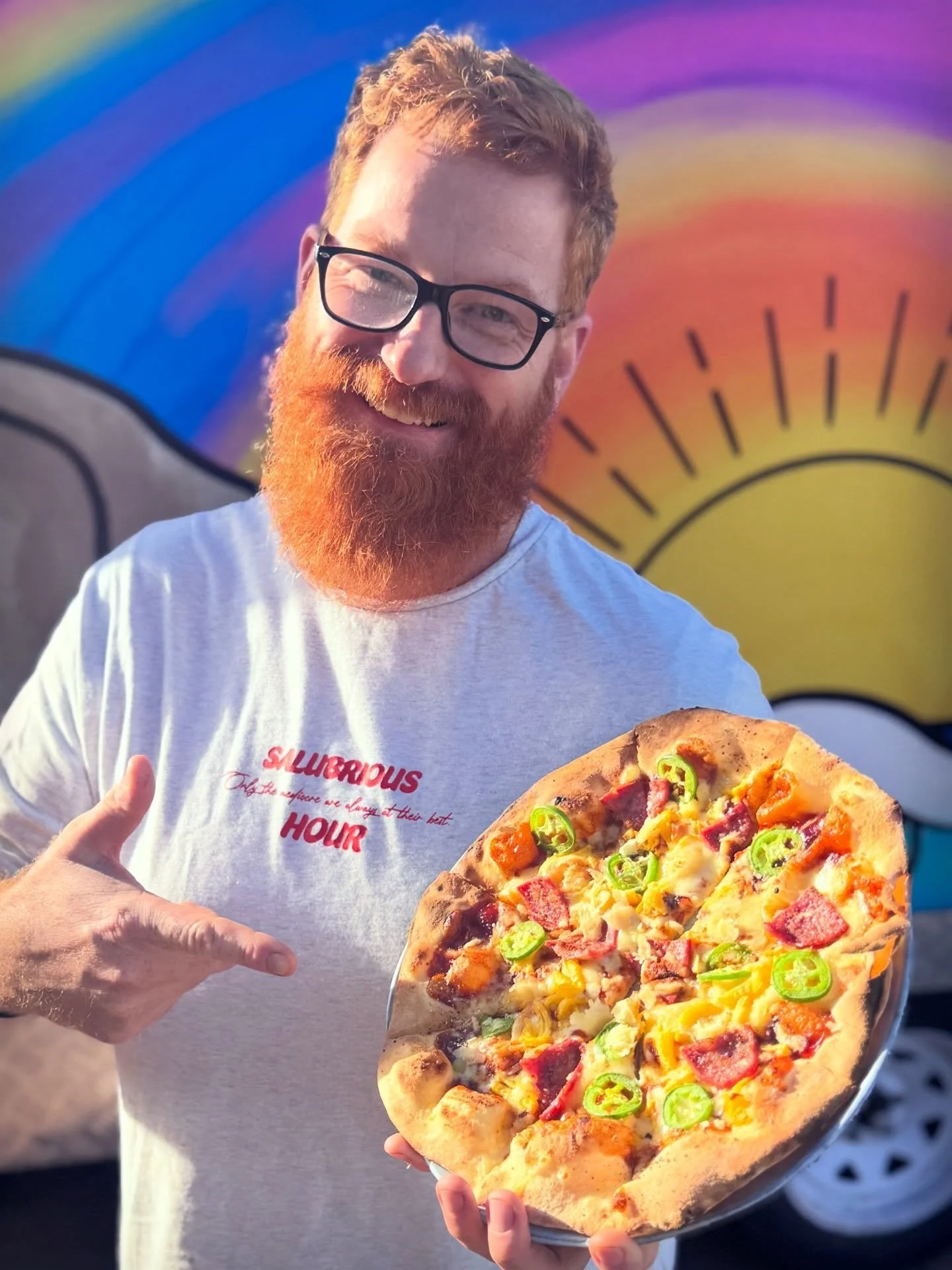 Hot Mess Express 🔥🍕 

Pepperoni, mozzarella, jalape&ntilde;o &amp; mango. 
$20, all weekend. 

Sweet. Spicy. Slightly chaotic. 
Like your group chat after two drinks. 

First drop in our weird pizza era!
Boss man&rsquo;s in the photo for this one..