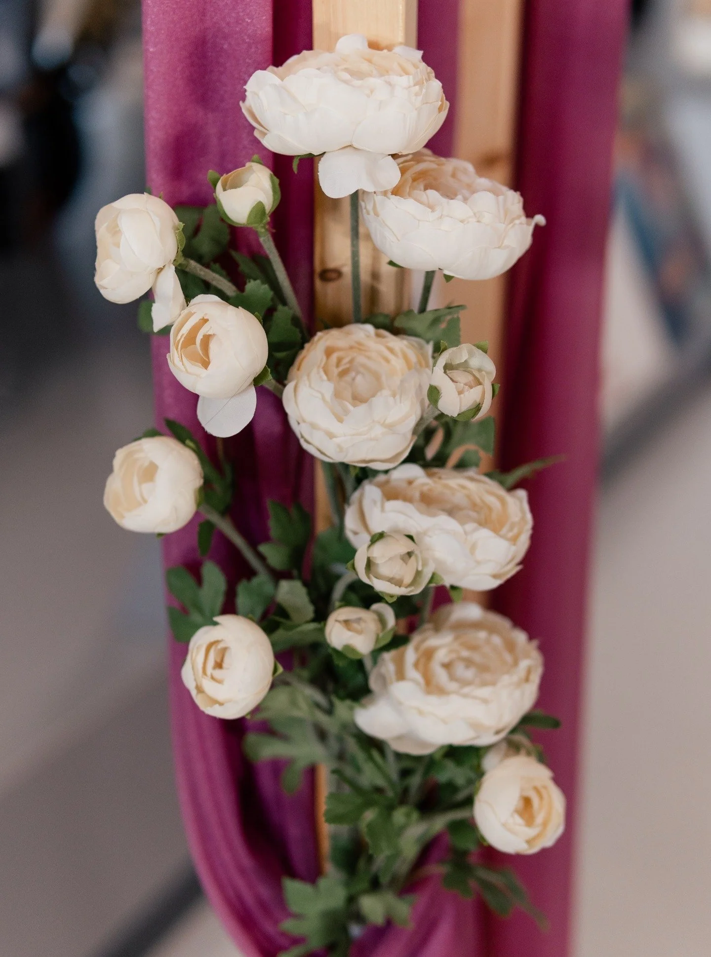 Every space comes with its own character&mdash;our role is to work with it, not against it.

For this ceremony, it was about softening structure, adding movement, and creating a focal point that felt intentional within an unexpected setting.

From th