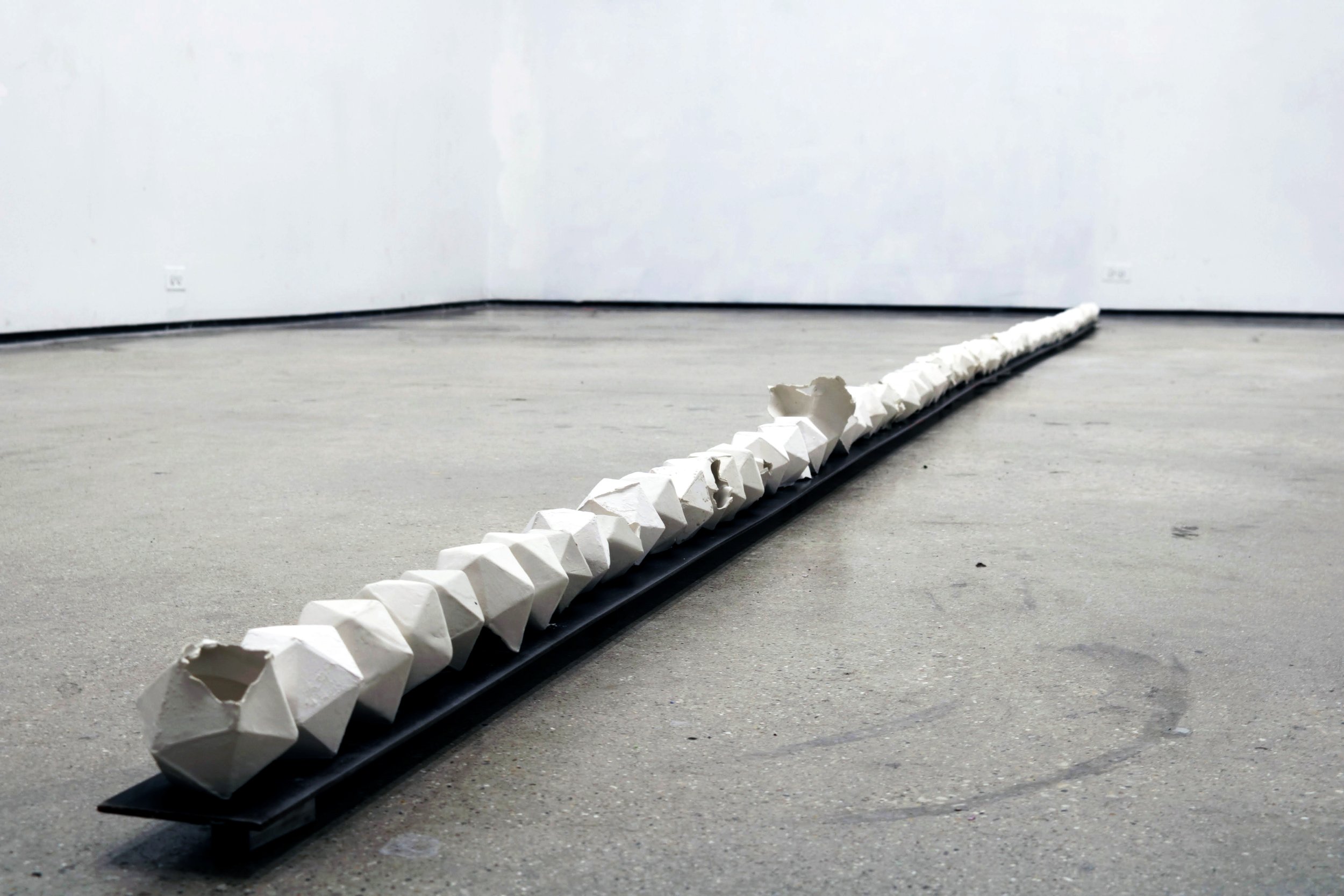 Untitled
2018
steel plate, unfired porcelain
144 x 3 x 4 in.