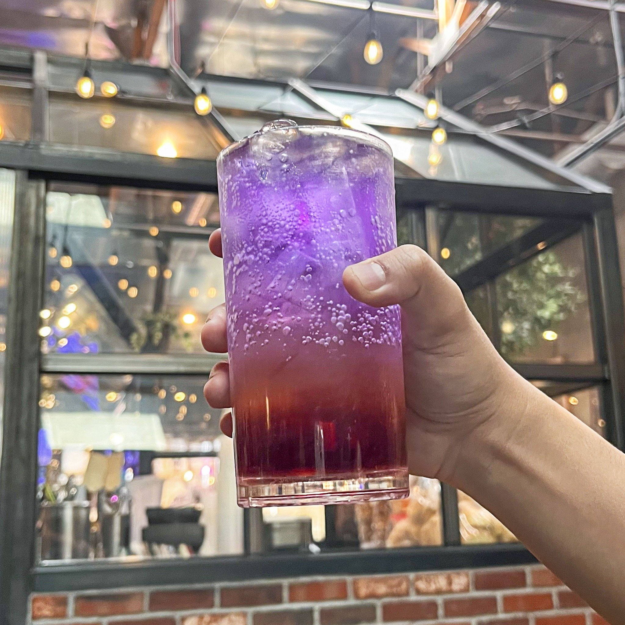 🌌🚀The whole galaxy in a glass! Capturing the colors and the sparkles, our beautiful sparkling Galaxy Ade drink is ready to take you on an adventure!🍹🌠 Come try at G&auml;bi!

🚗 Available on Uber Eats, Grubhub, &amp; Doordash for delivery! Tap th