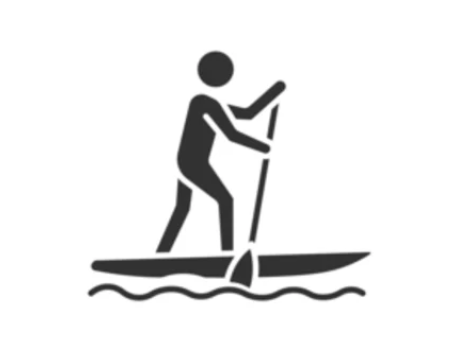 Silhouette of a person paddleboarding on water.