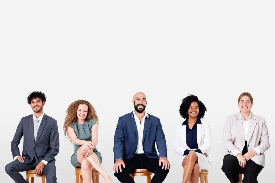 diverse-business-people-smiling-while-sitting-jobs-career-campaign_53876-127146.jpg