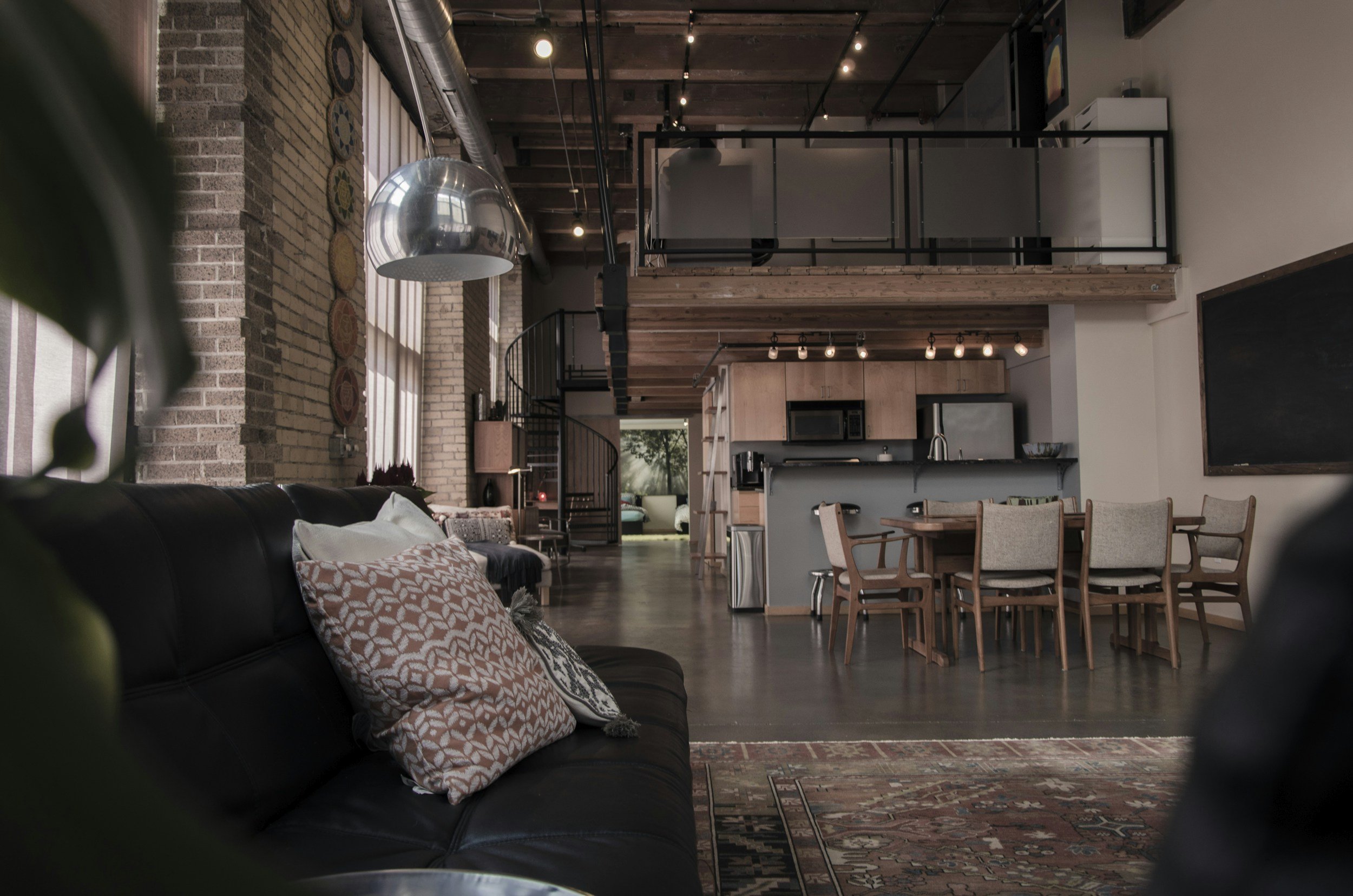 What luxury home buyers look for: Luxury loft for sale.Loft-style apartments in Toronto.Exposed brick lofts for sale. Industrial loft apartments.Modern loft with open-concept design.Loft with spiral staircase
Urban loft living.High-ceiling apartments
