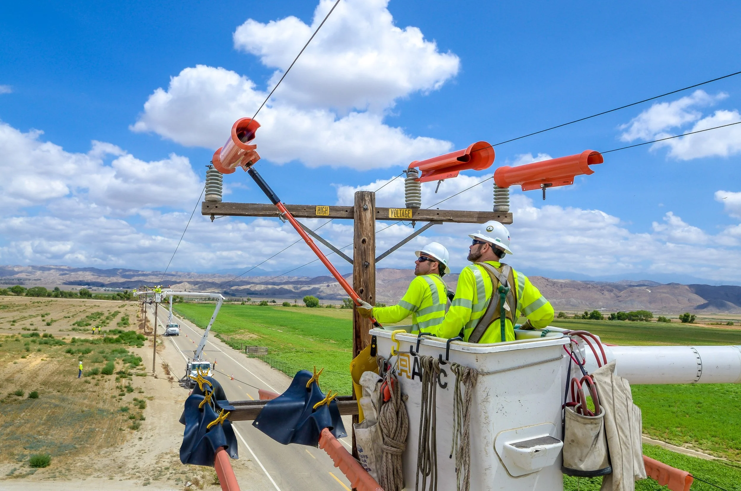 Utility power line workers in bucket truck high voltage work, Los Angeles, Southern California, Greater Sacramento Valley, SF Bay Area, Northern California Photographer Traveling Nationwide
