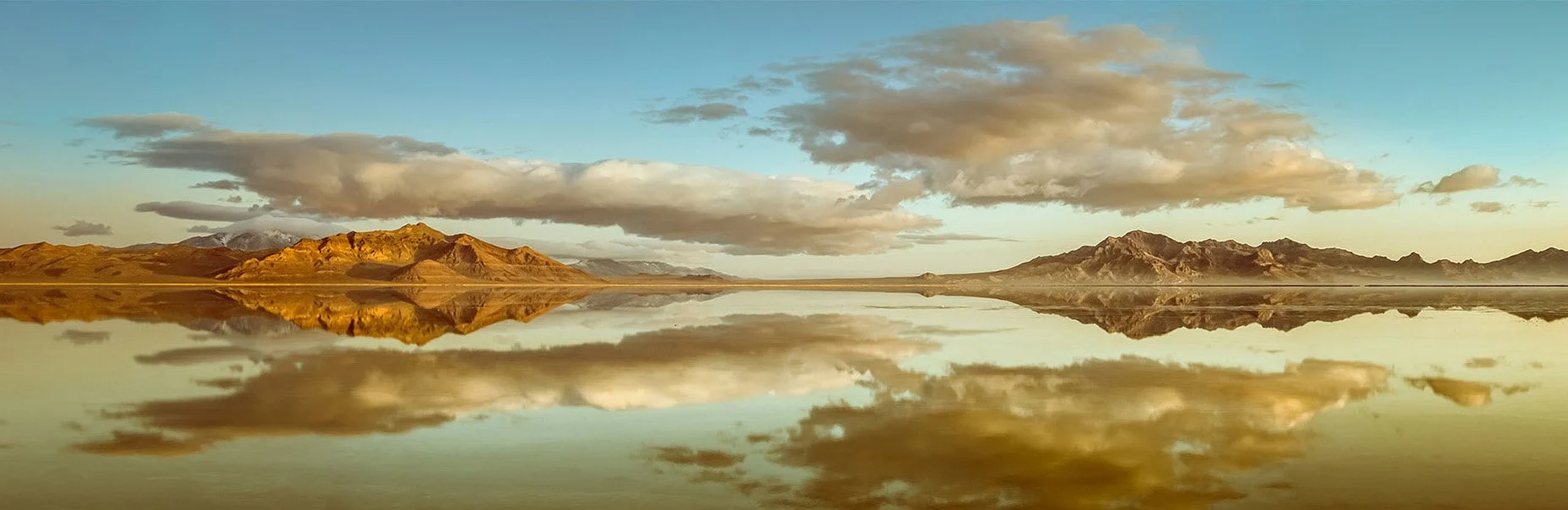 Sunrise reflections of the flooded Utah bonneville Salt Flats