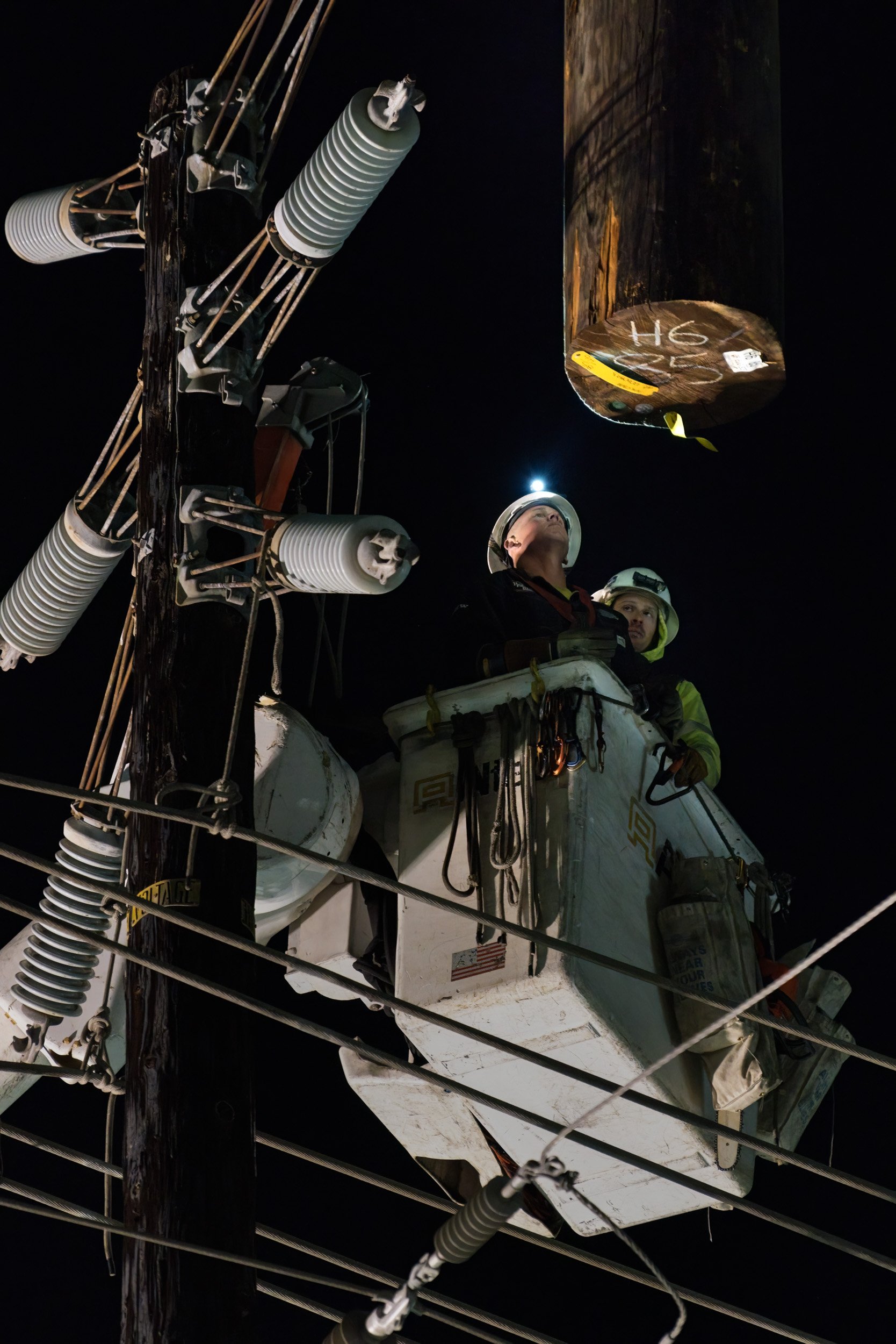 Night construction utility workers doing pole replacement on Sunset Blvd. Hollywood, Los Angeles, Southern California, Greater Sacramento Valley, SF Bay Area, Northern California Photographer Traveling Nationwide
