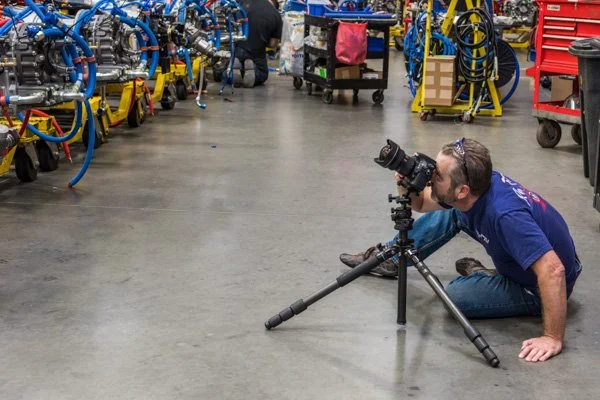 Duane shooting from the floor at the Gillig bus factory