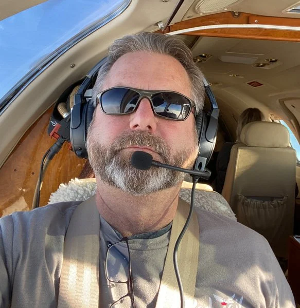 Duane as the co pilot flying to southern CA for a shoot