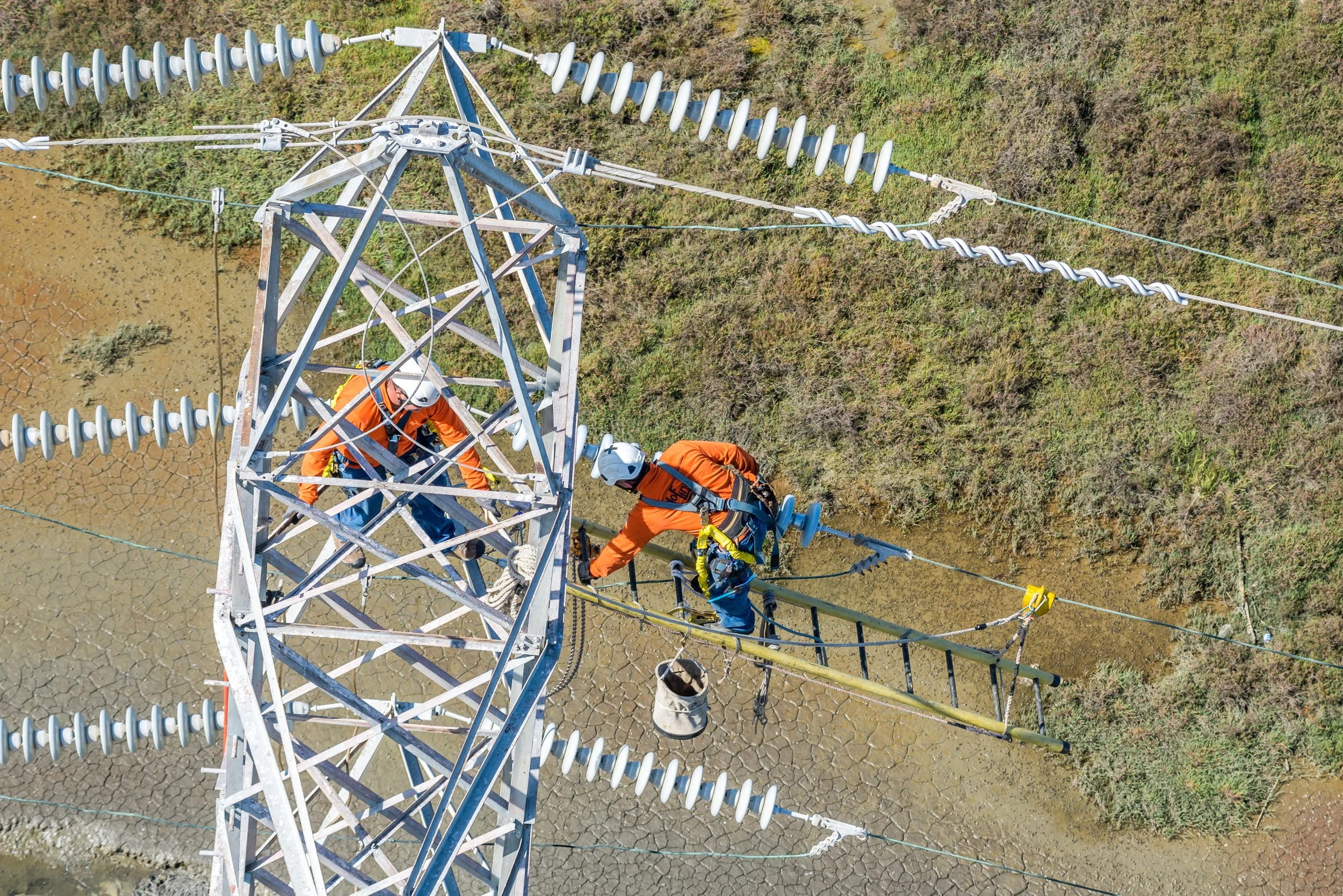 High Voltage Lineman utility workers from helicopter, San Francisco, San Jose, Oakland, SF Bay Area, Northern California