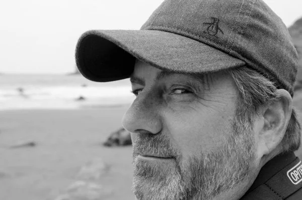 Duane at the beach in black and white