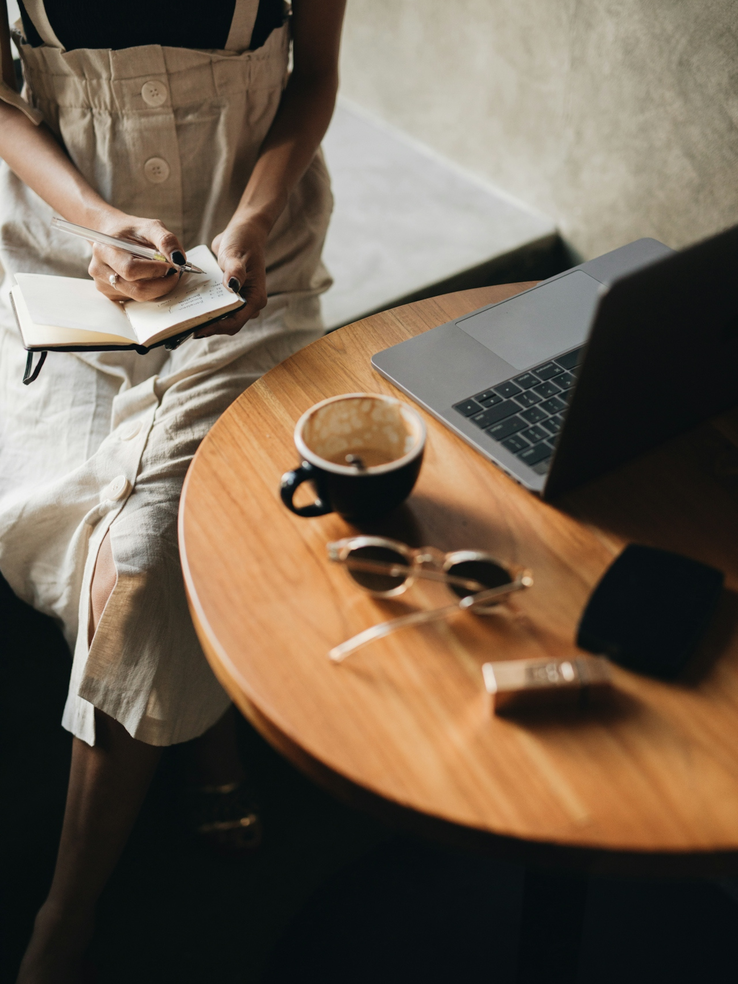 Coffee and laptop writing