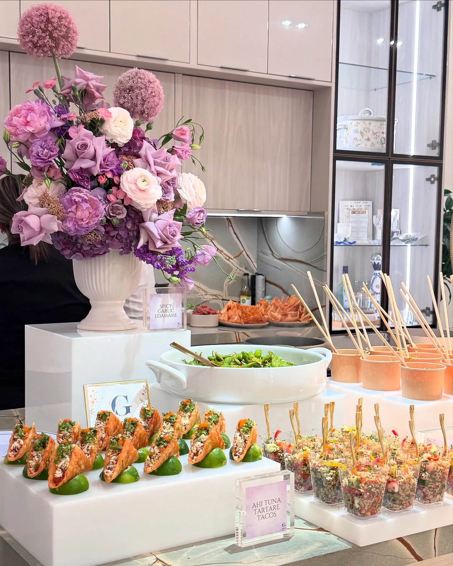 A client favorite : the Ahi tuna tacos&mdash;a best-seller for a reason.

Freshly diced Ahi tuna, finished with a touch of sriracha, delicately served in a crispy shell and perched on a fresh lime. A vibrant pop of color and flavor, they add an eleva