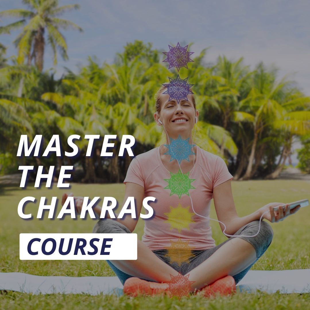 a woman meditating with chakras along her body