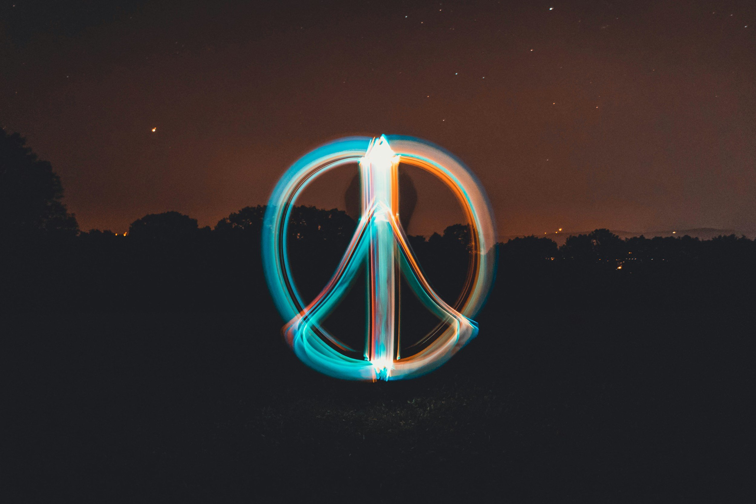 Scaling Peace in a World of Arms Races