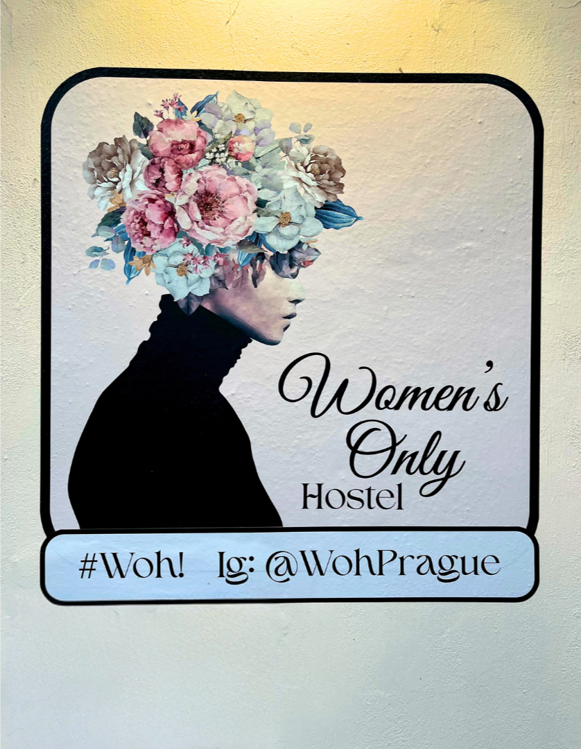 Painted sign of Women Only Hostel in Prague, Czechia