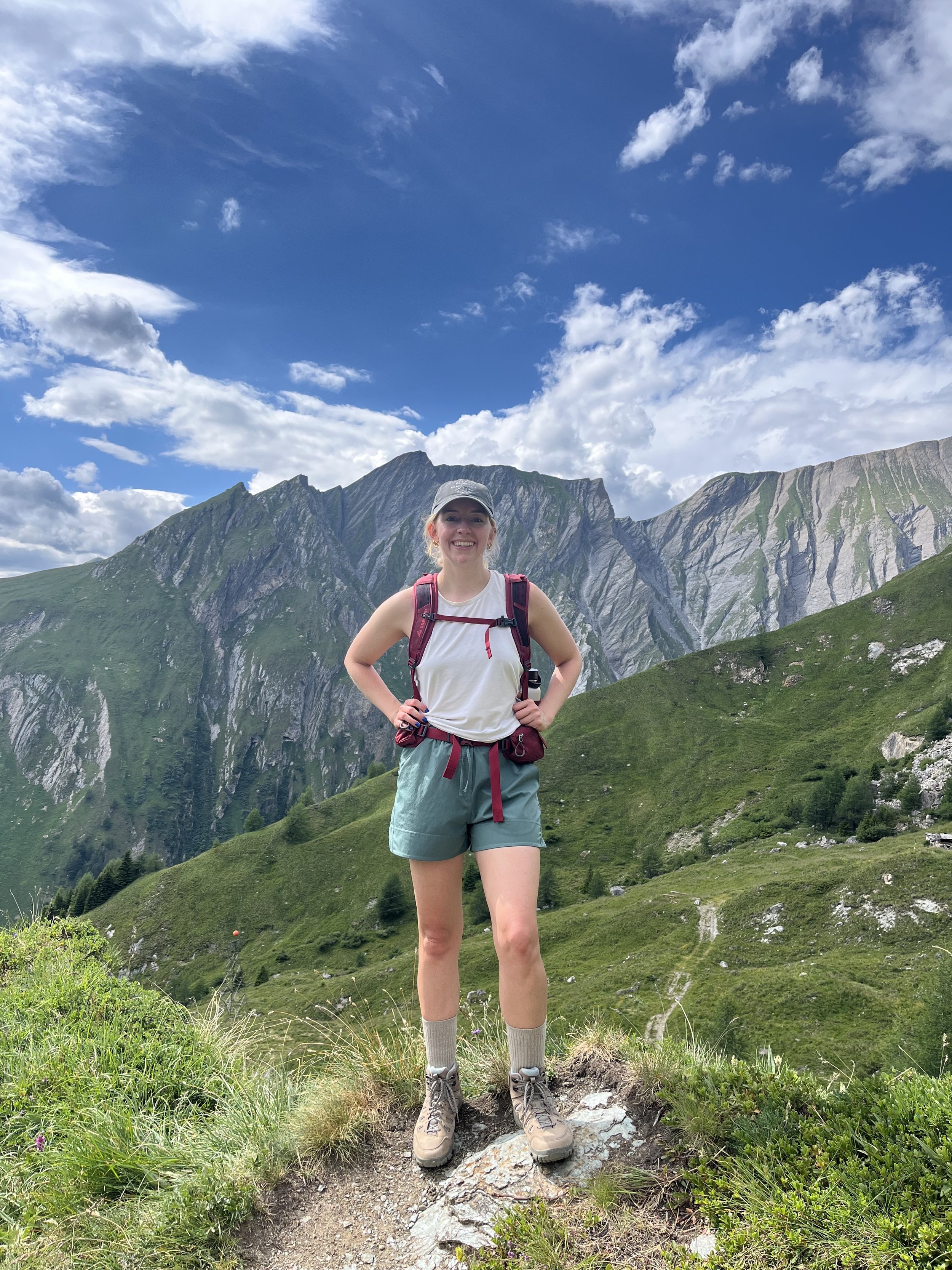 Woman hiking through Austrian Alps. Donkey Trail to Glorer Hut