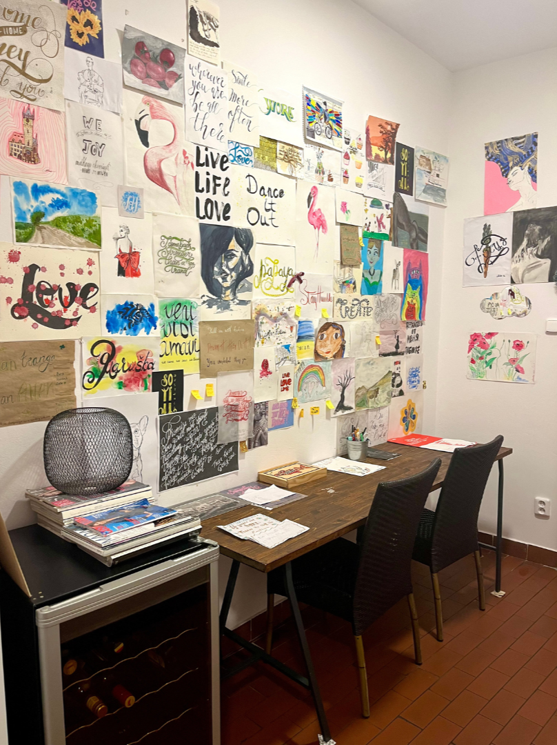 Womens Only Hostel Work Space with Artwork from previous travelers Prague