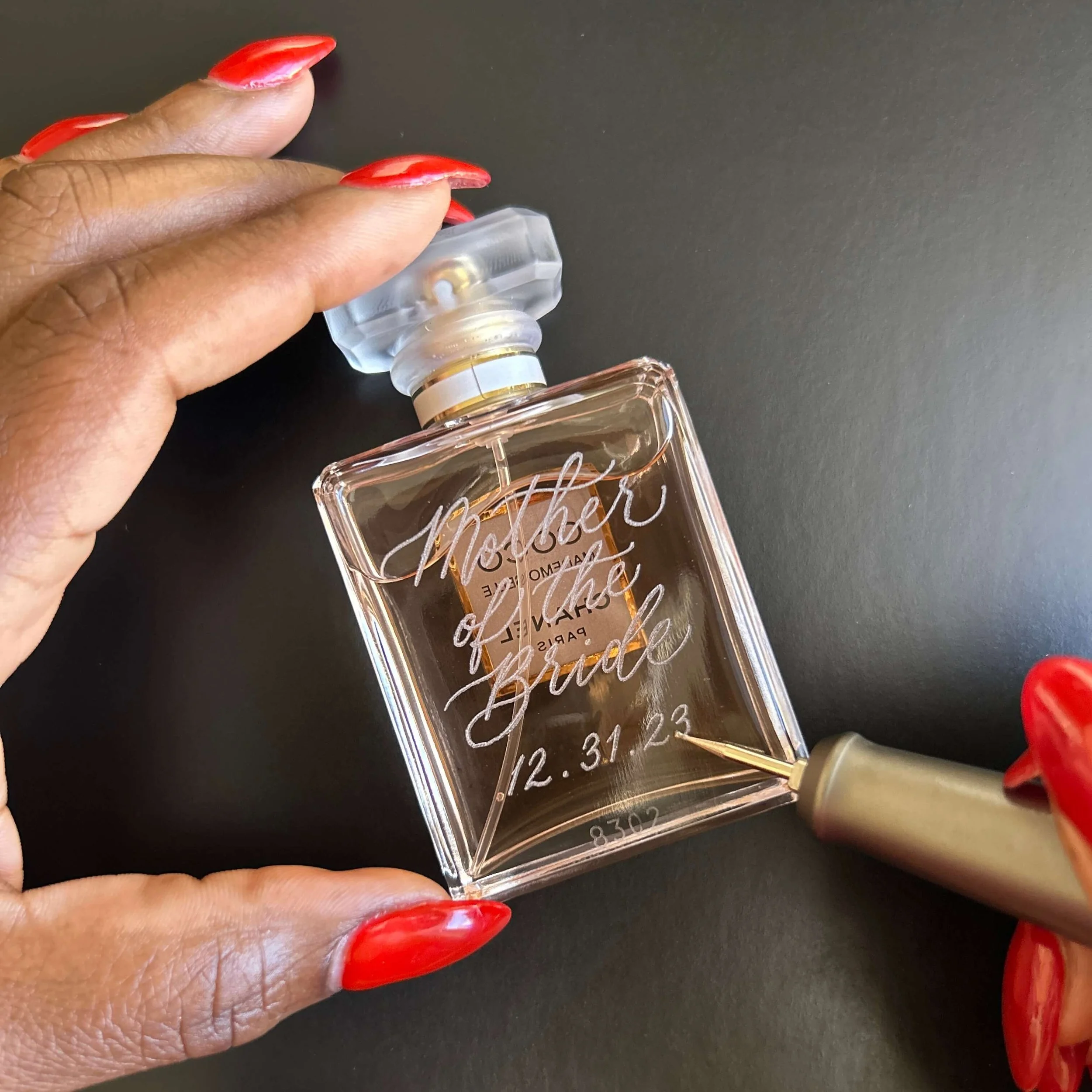 hand-etching-Chanel-Coco-Mademoiselle-perfume-bottle-engraving-tutorial-Monterey-engraver-Heirloom-Ink-Studio-Alishia-Nastas.jpg