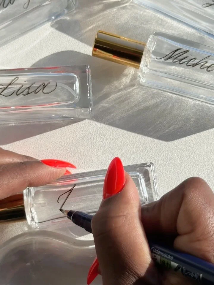 Personalized and Engraved Perfume Bottles for the Bridesmaids | From Draft to Delivery ✍🏾📦✨

Every engraved perfume bottle begins with a hand-drafted name. I sketch each one in my signature calligraphy style and send it for approval before engravin