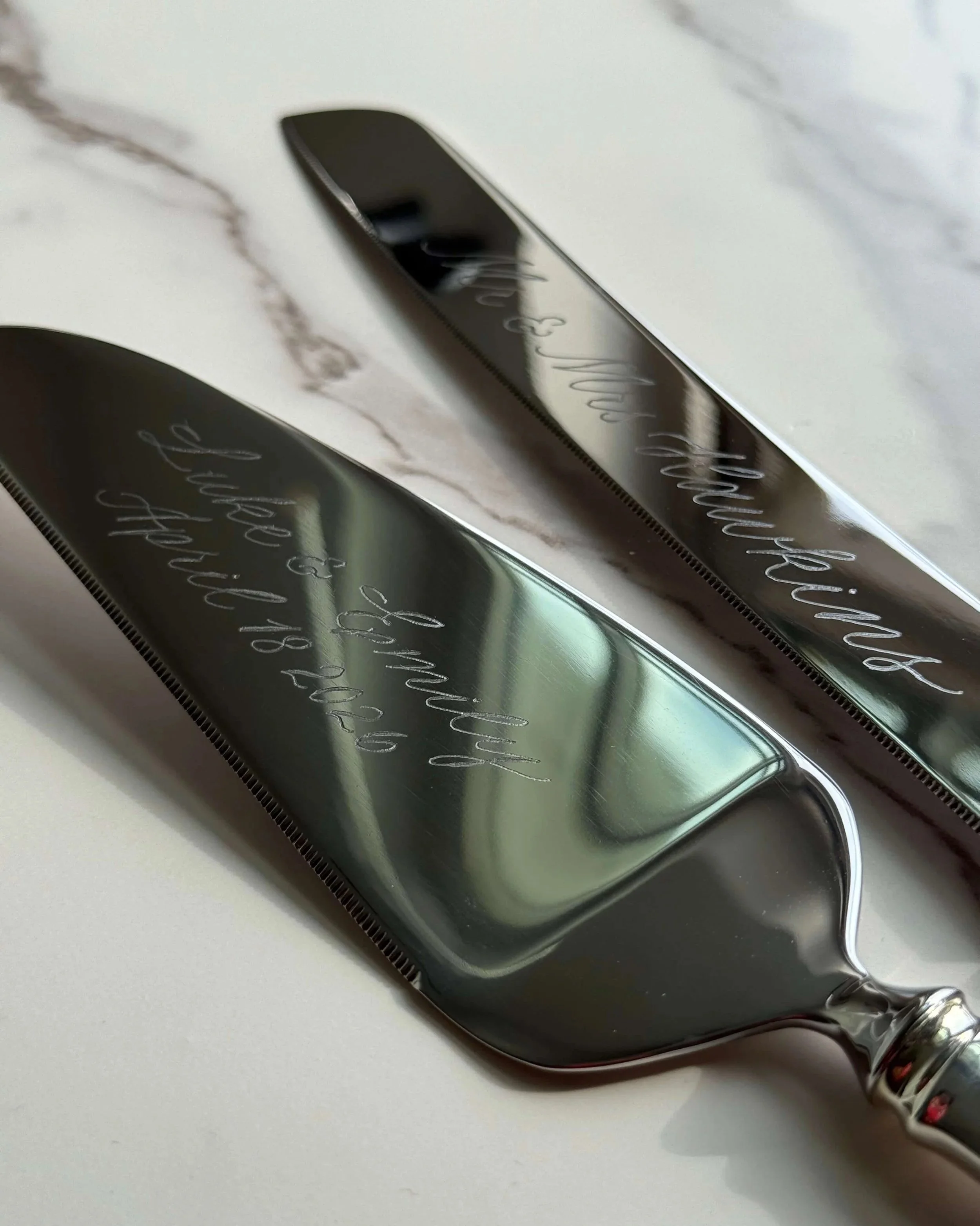 Custom engraved wedding cake cutting set from Tiffany and Co.