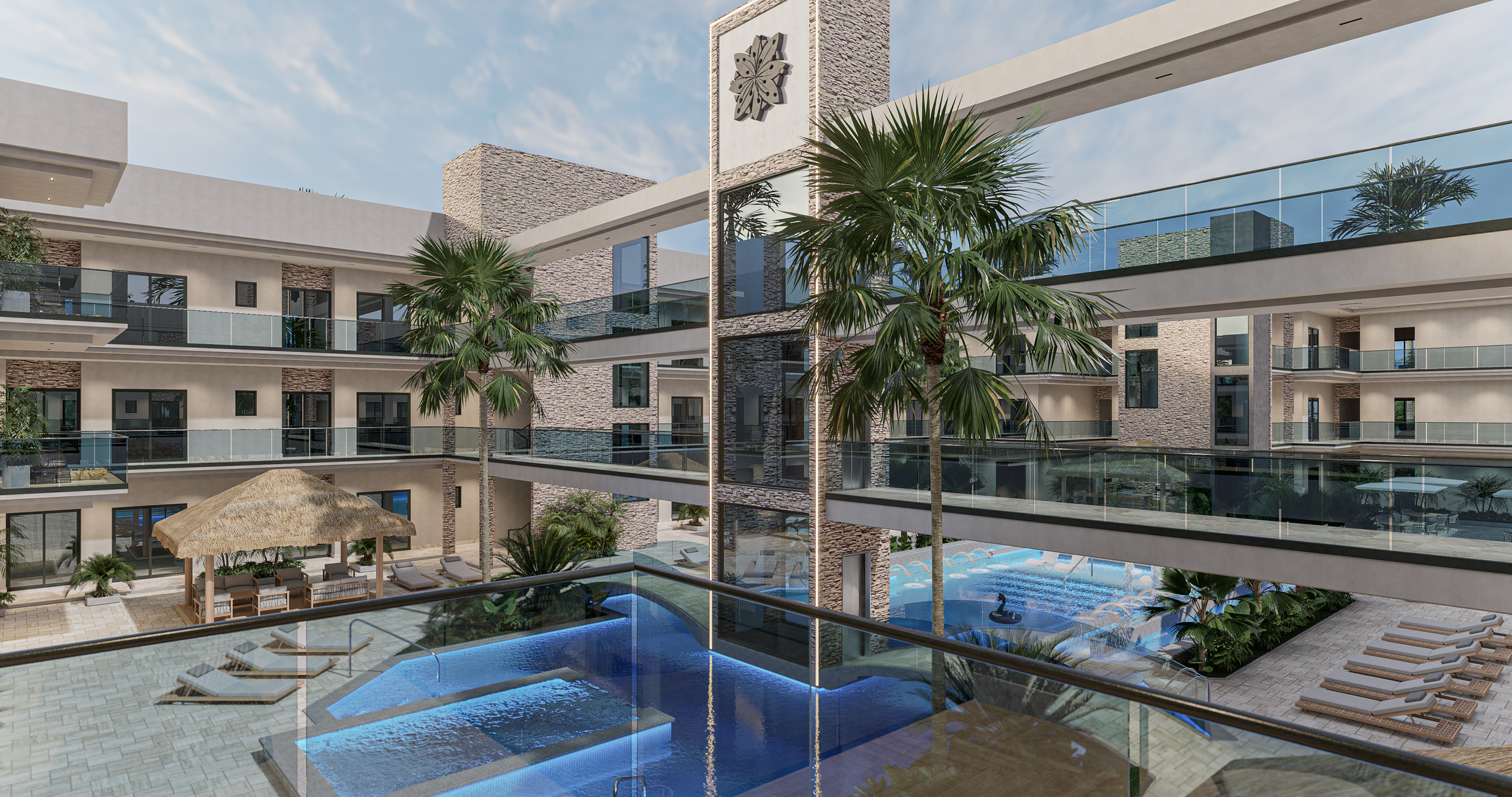 Modern apartment complex with a central courtyard featuring a swimming pool, palm trees, and lounge chairs under a thatched umbrella, surrounded by multiple levels of balconies.
