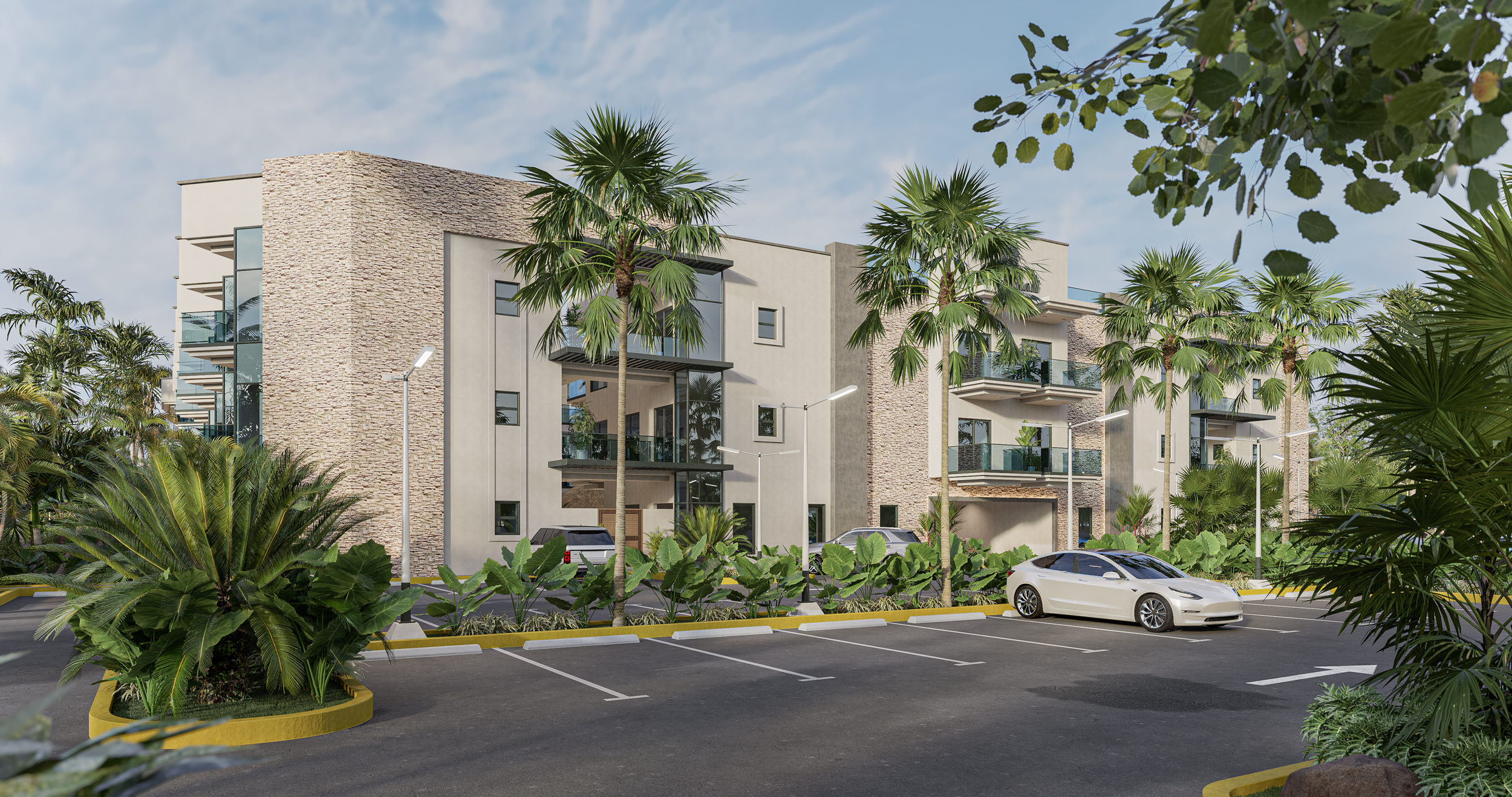Modern apartment complex with stone and stucco exterior, palm trees, landscaped greenery, and a parking lot with a white car.