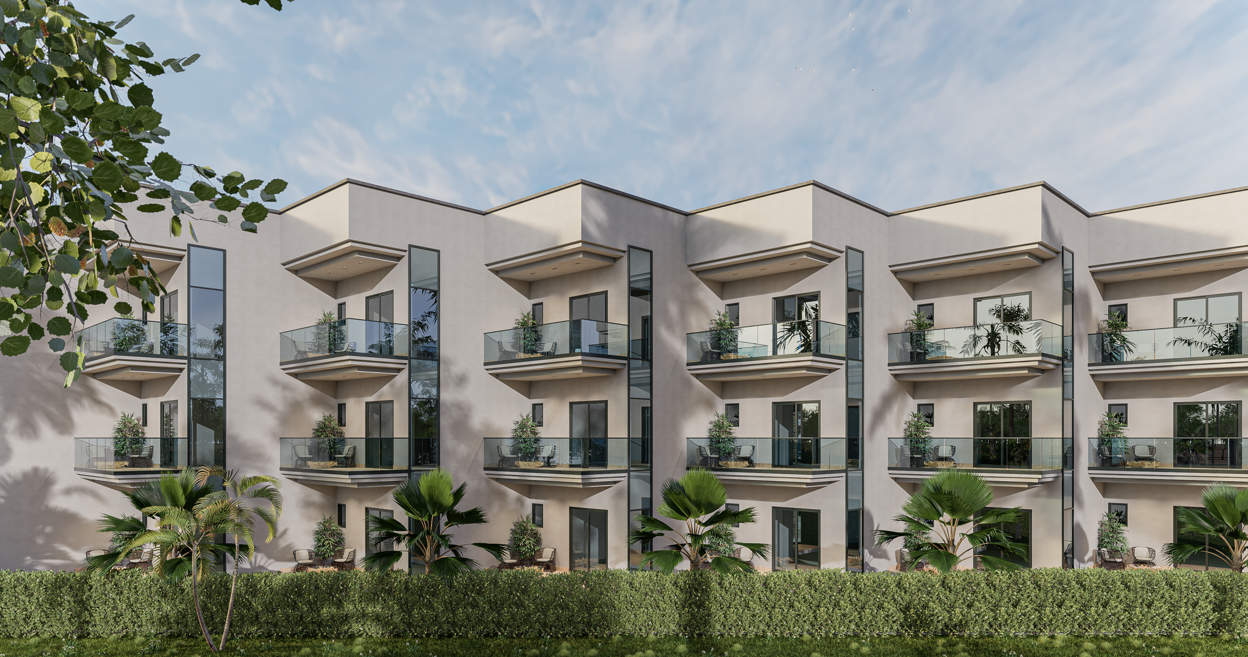 Modern apartment building with multiple balconies, glass railings, and potted plants, surrounded by greenery and a blue sky.