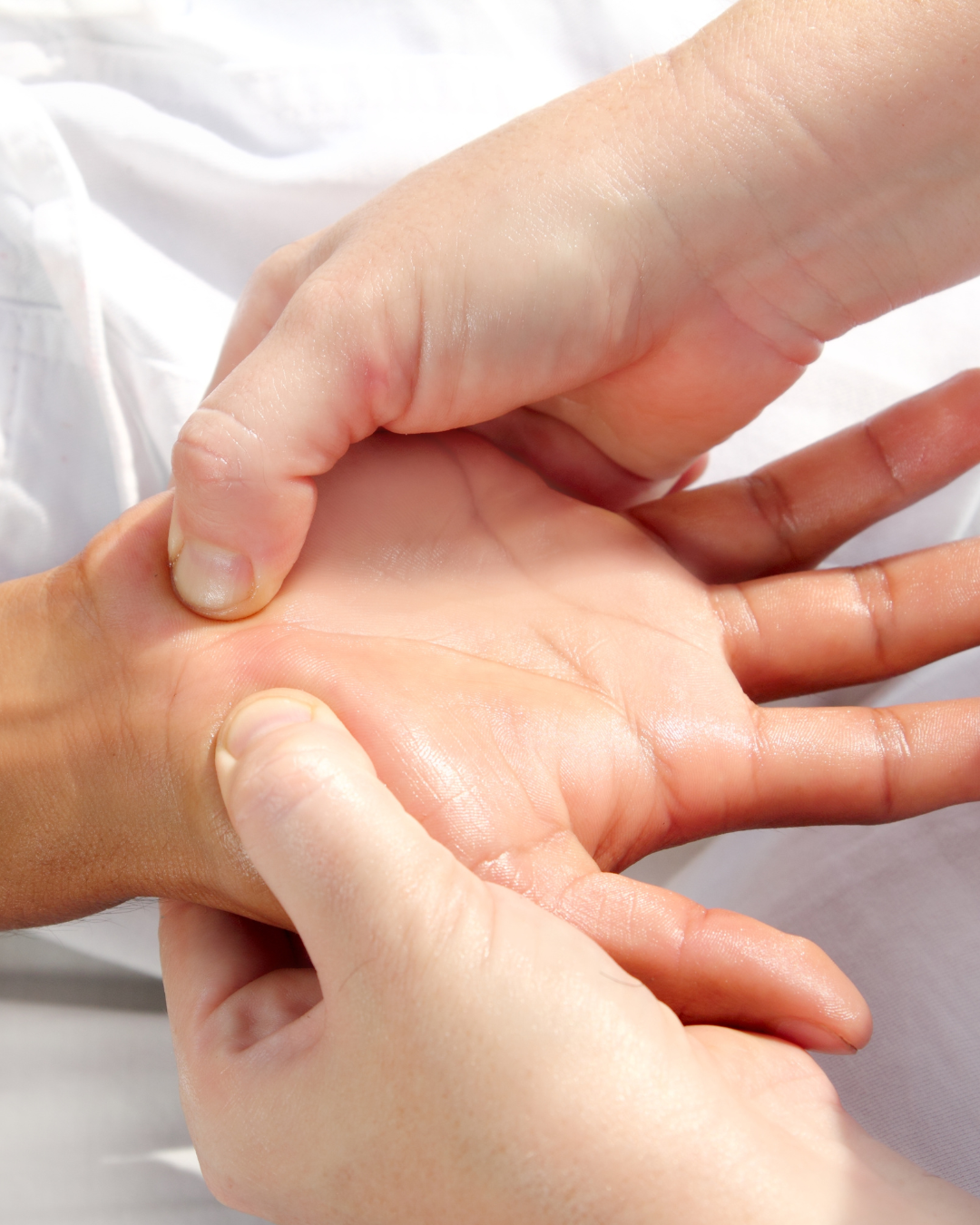 Licensed practitioner performing reflexology in Portland, Oregon