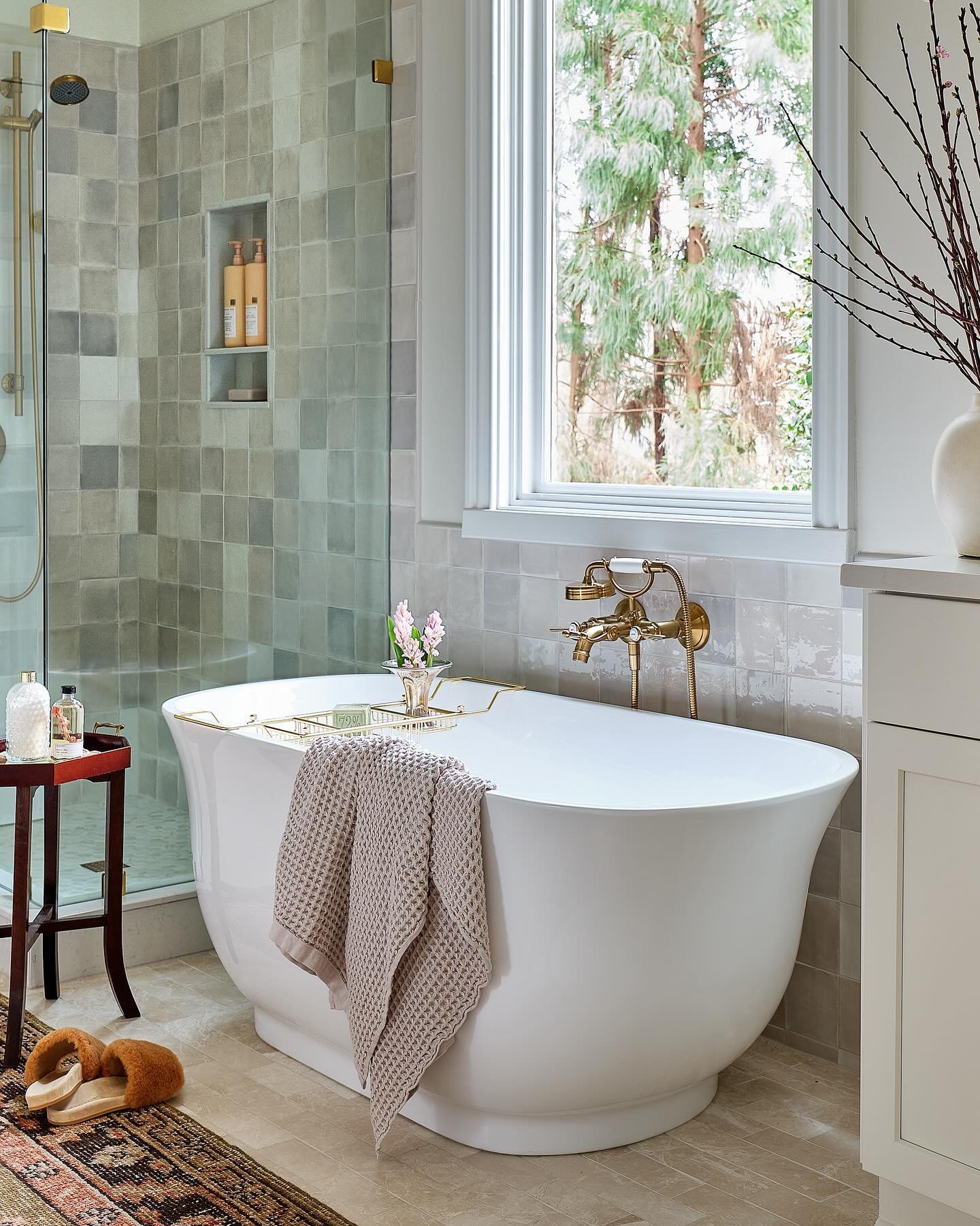 We are so happy that our clients are finally enjoying their newly renovated primary bathroom retreat 🤍 This elegant freestanding tub with a gorgeous brass faucet makes a stunning statement in our #TheRidgeProject. Ahhhh to enjoy a dreamy relaxing so