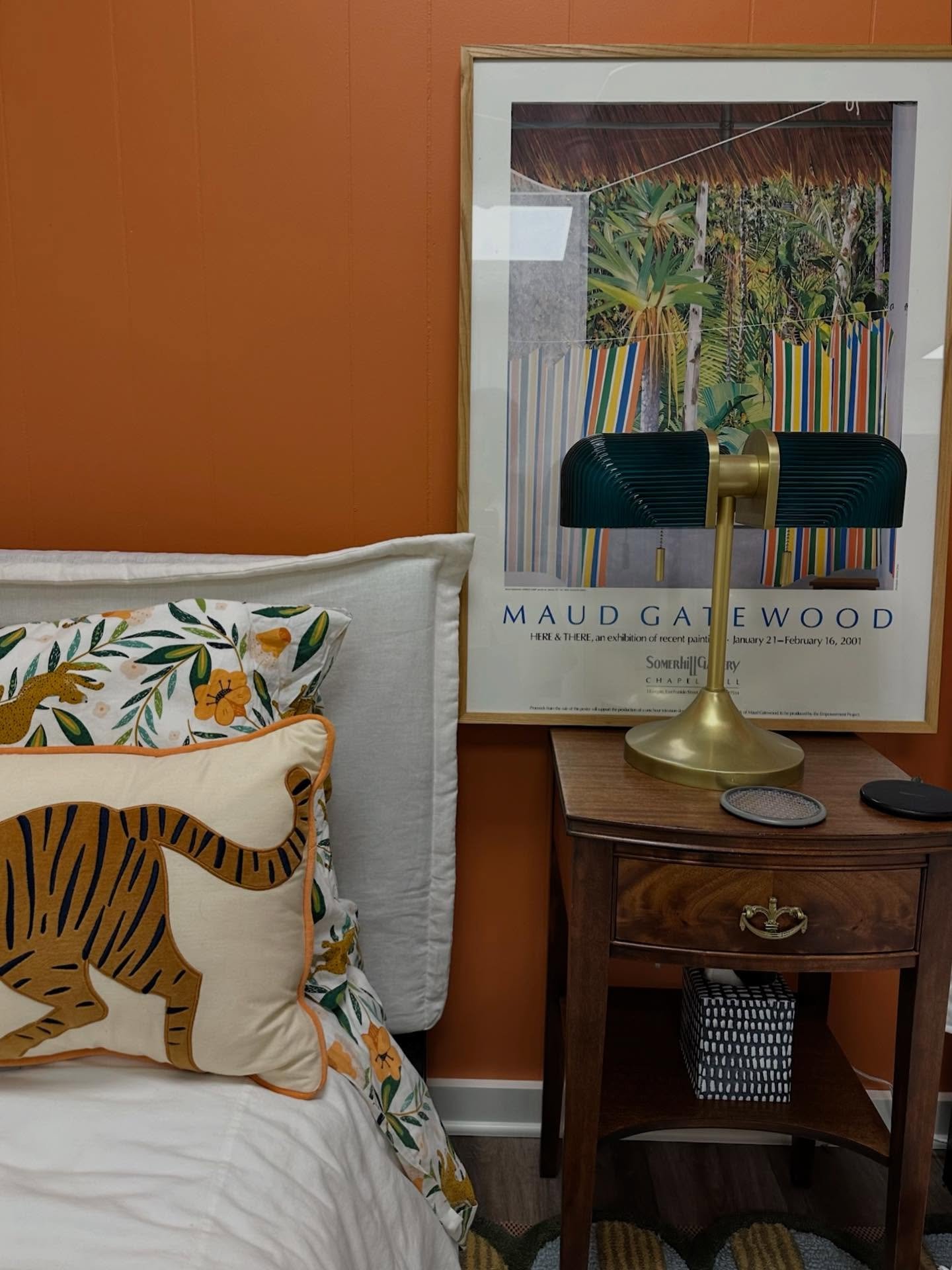 Sneak peek: Things are getting a little wild in this kids bedroom 🐅 The burnt orange walls and tiger motif are serving fun jungle retreat vibes perfect for sleepovers 🌿💛 A beautiful brass lamp and vintage side table add elements that can grow righ