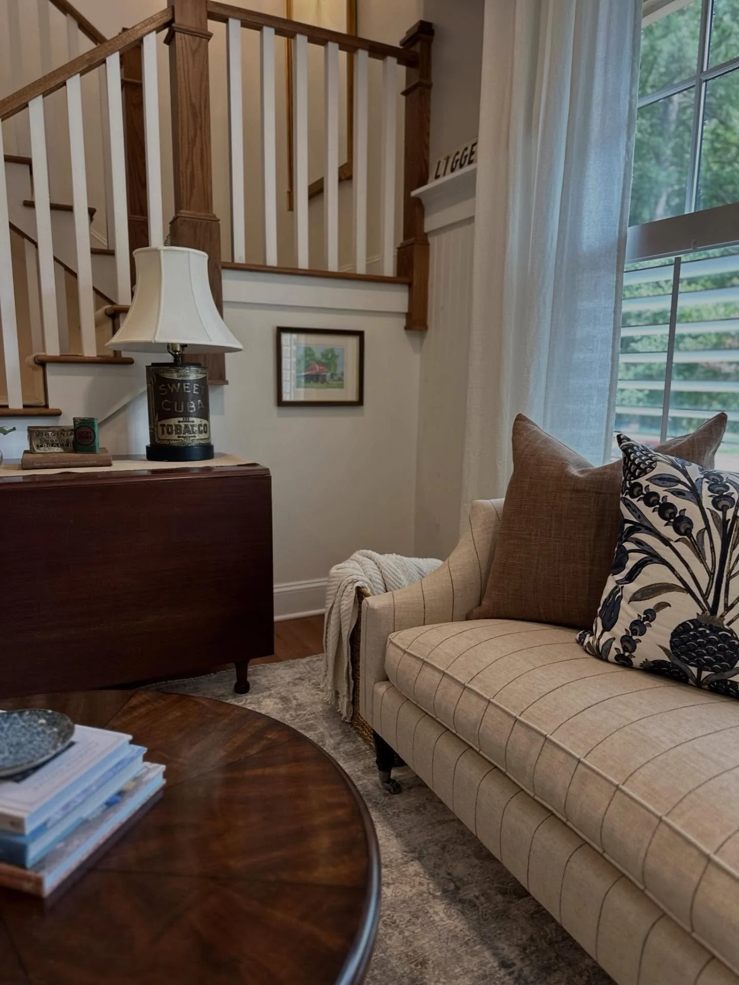 Today we&rsquo;re revisiting this cozy corner at our #WattsHillandalProject ✨ We love how this room came together with a combination of new and old elements. We selected a striped linen sofa to set the tone with tailored elegance, and layered pillows